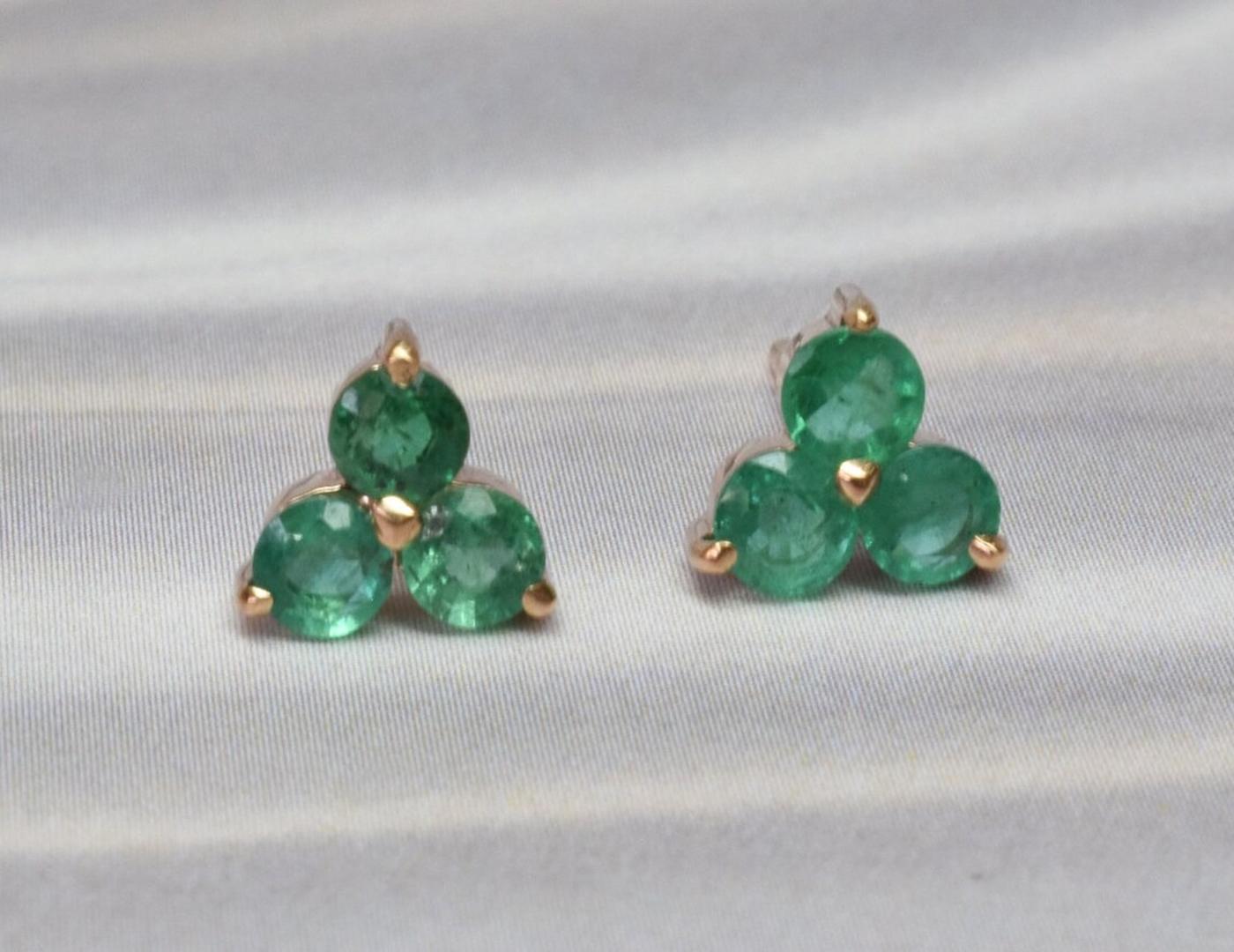 Emerald Floral Earrings in 14k Rose Gold, Yellow Gold, White Gold.

These Dainty Stud Earrings are made of solid 14k gold featuring shiny brilliant round cut natural diamonds set by master setter in our studio. Simple but unique, elegant and easy to