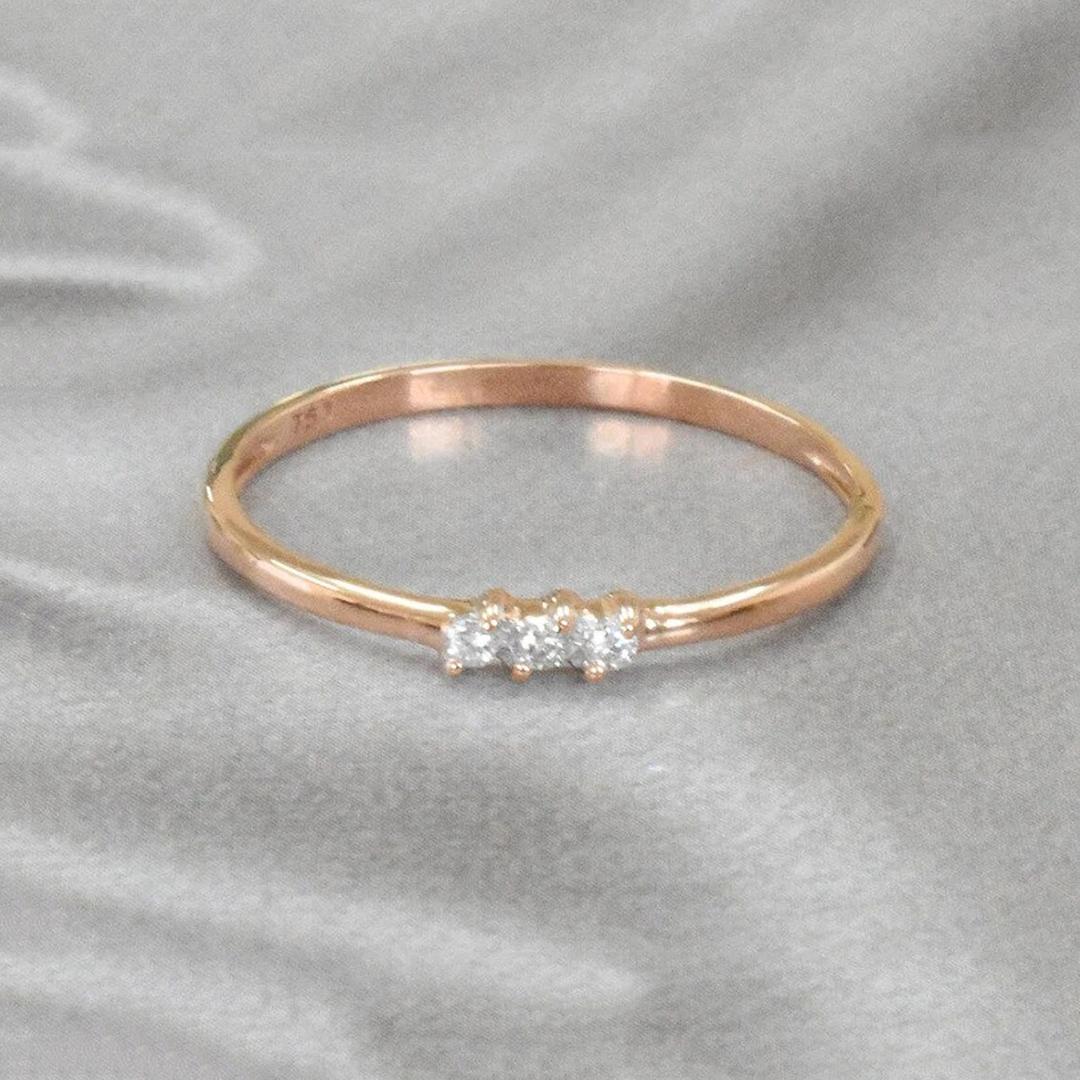 For Sale:  14k Gold 0.03 Carat Trio Diamond Band Ring  6
