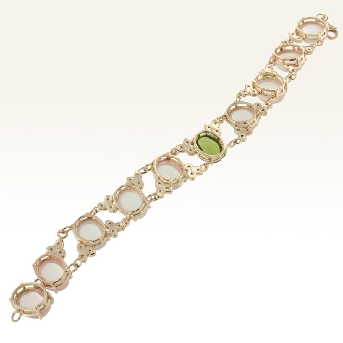 Oval Cut 14 Karat Rose Gold with Pink Quartz Peridot and White Diamonds Bracelet For Sale