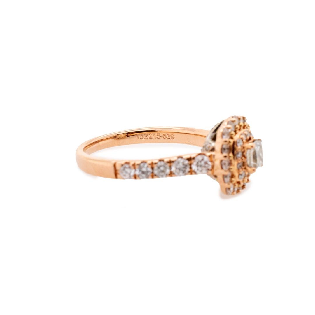 One ladies custom made polished, 14K white gold and 14K rose gold, diamond engagement, double-halo ring with a soft-square shank. The ring is a size 7, is 1.41mm thick and measures approximately 2.87mm tapering to 2.14mm in width and weighs a total