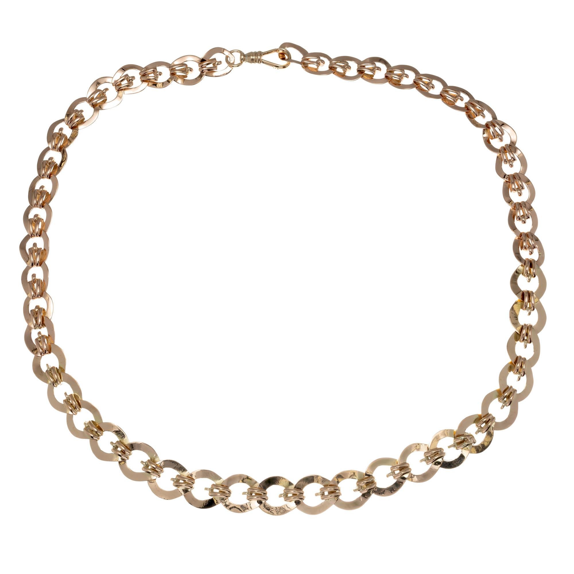 1900's two tone 14k yellow and rose gold link necklace. Swivel catch. 19.75 Inches long.

14k yellow gold 
14k rose gold 
Tested: 14k
34.5 grams
Total length: 19.75 Inches
Width: 9.8mm
Thickness/depth: 4mm

