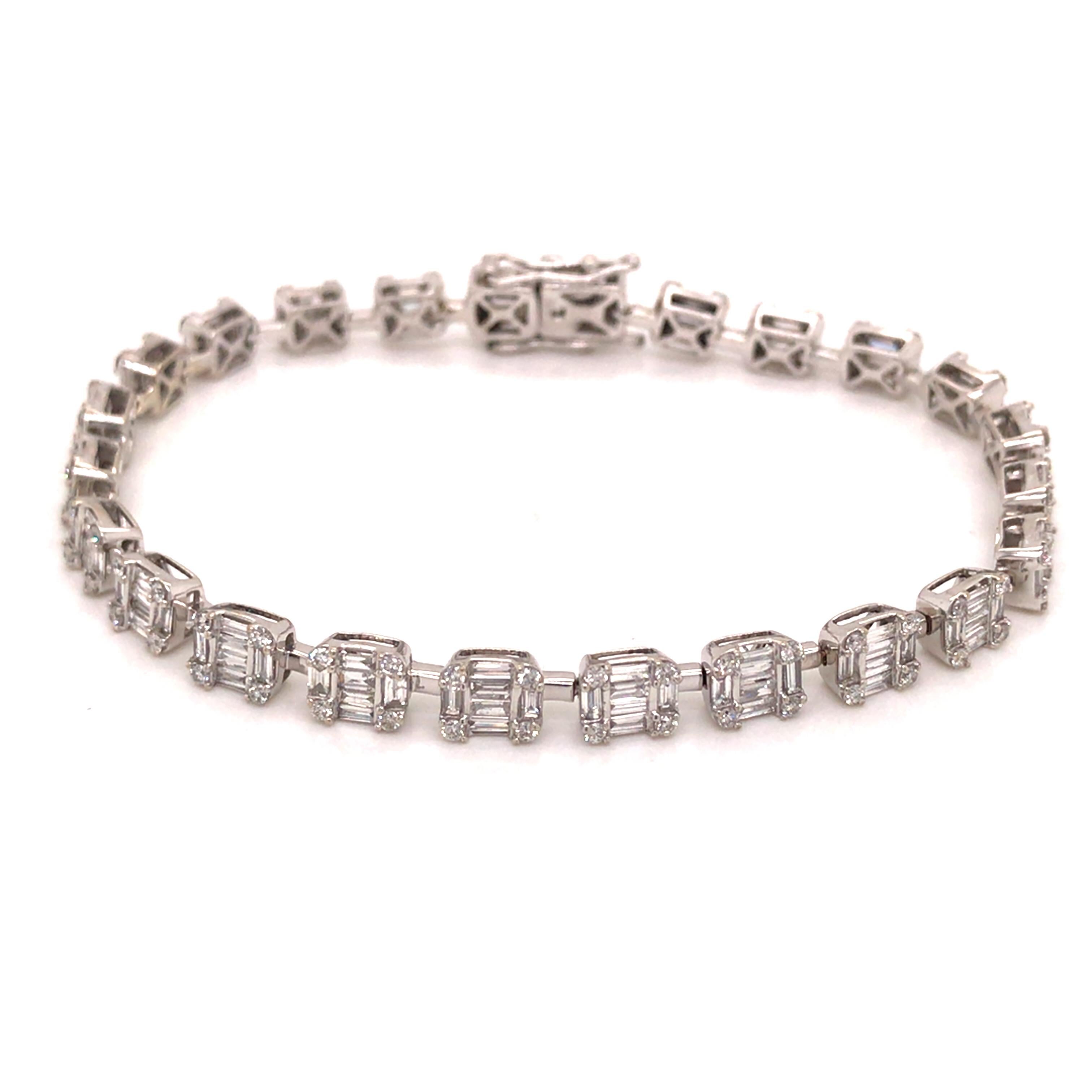 Round and Baguette Diamond Bracelet in 14K White Gold.  Round Brilliant Cut and Baguette Diamonds weighing 3.34 carat total weight, G-H in color and VS-SI in clarity are expertly set in clusters.  The Bracelet measures 7 inch in length and 3/16 inch
