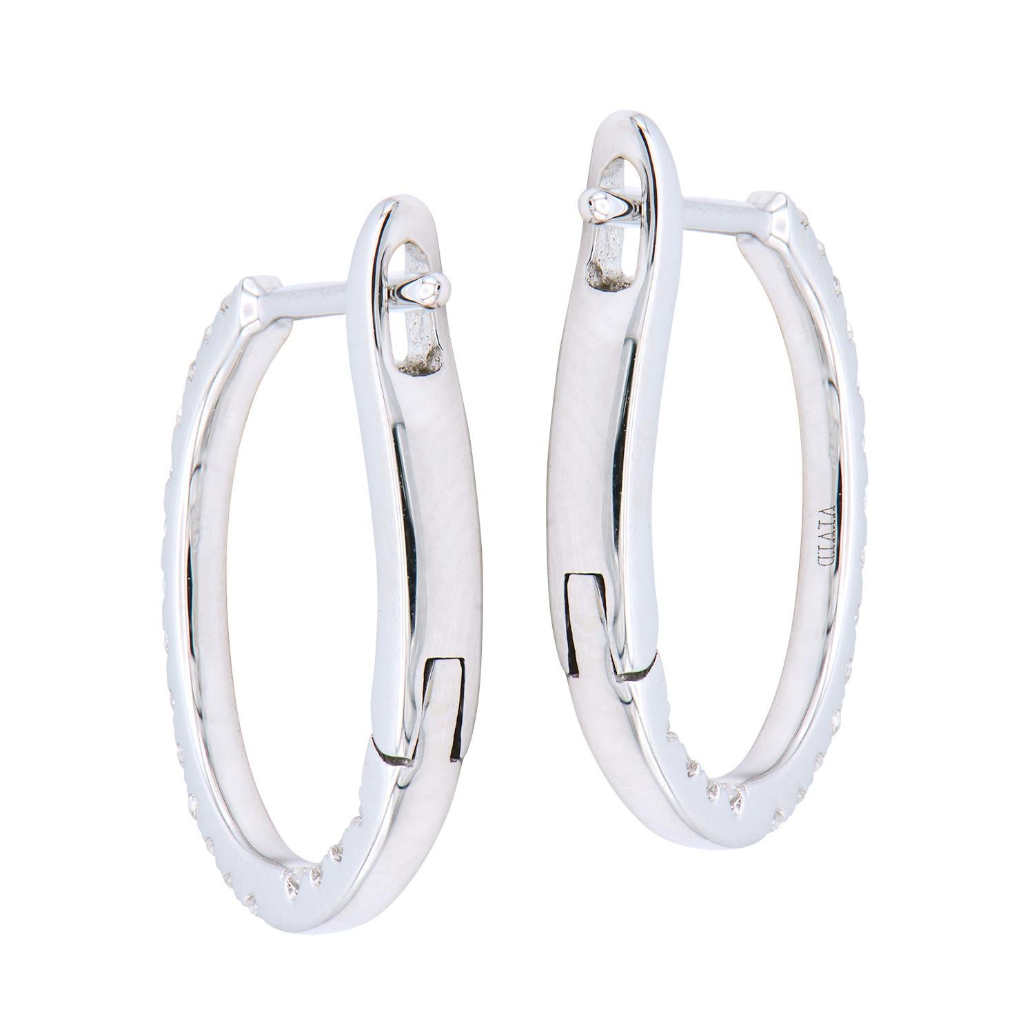 Contemporary 14k Round Diamond Huggies/Hoops For Sale