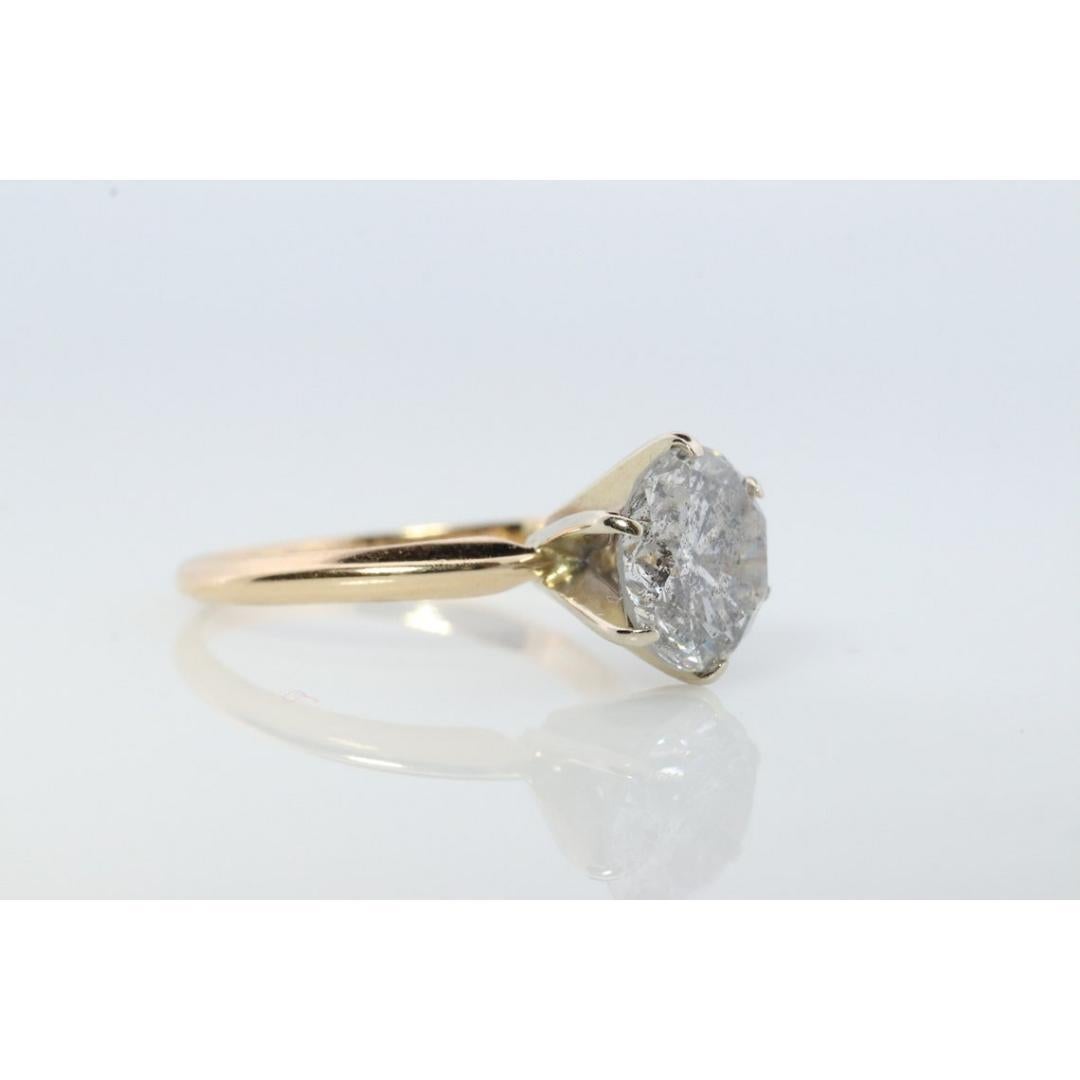 Vintage from the 1990s
Size: 6 US
Materials: Rose gold
Gemstone: Diamond
Gem color: Colorless
Band color: Yellow

Style: Minimalist

Huge Diamond engagement ring. High Quality Round Diamond solitaire prong set.

Ring is appraised at $9000
