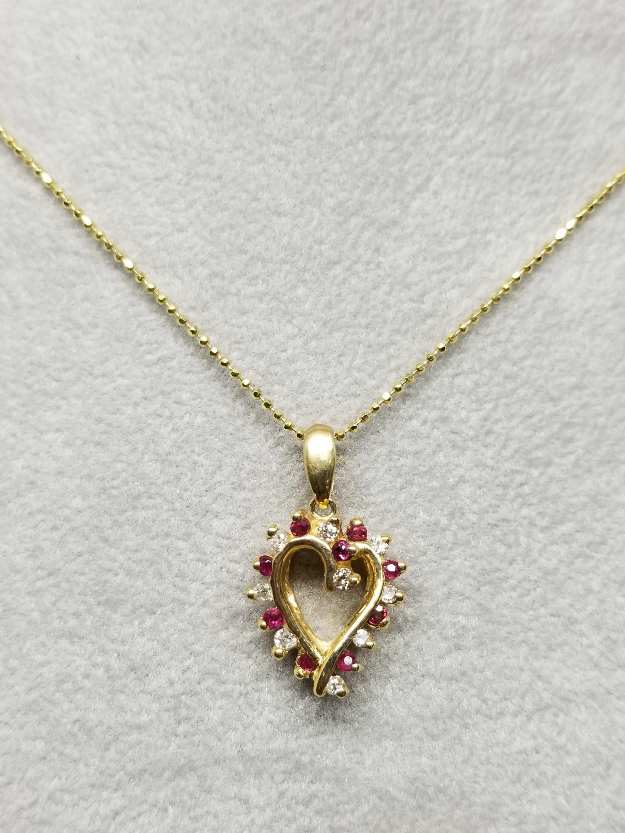 Contemporary 14 Karat Ruby and Diamond Heart For Sale