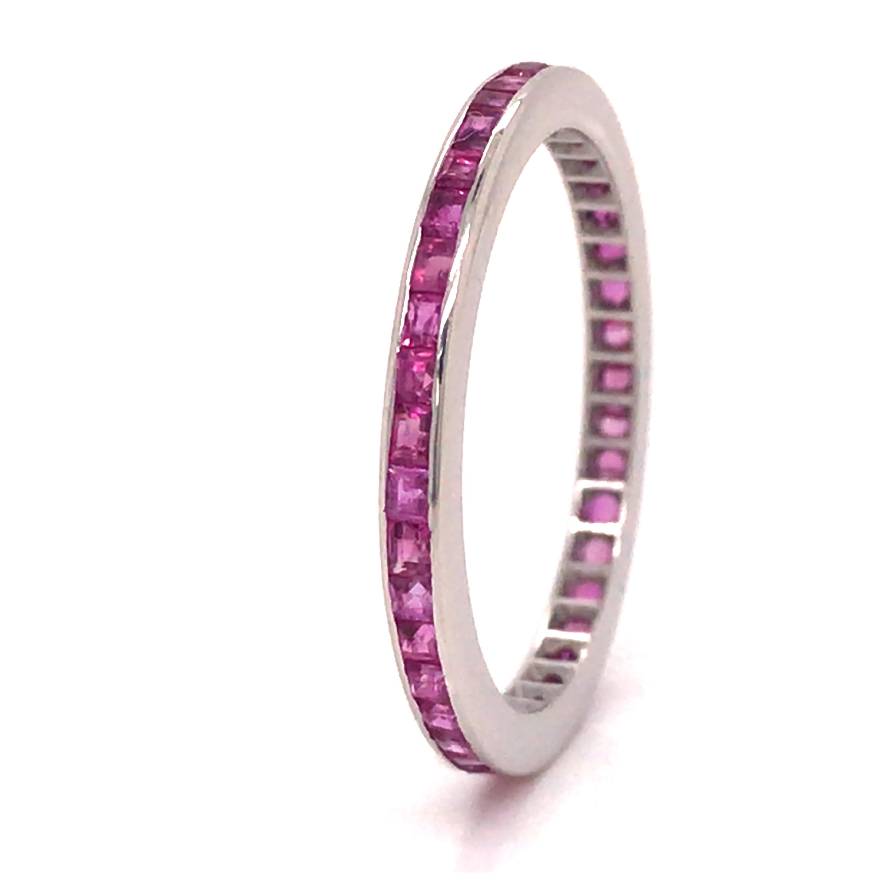 Ruby Channel Set Thin Eternity Band in 14K White Gold.  (80) Ruby Gemstones weighing 1.0 carat total weight are expertly channel set.  The Ring measures 1/16 inch in width.  Ring size 6 3/4. 1.39 grams.