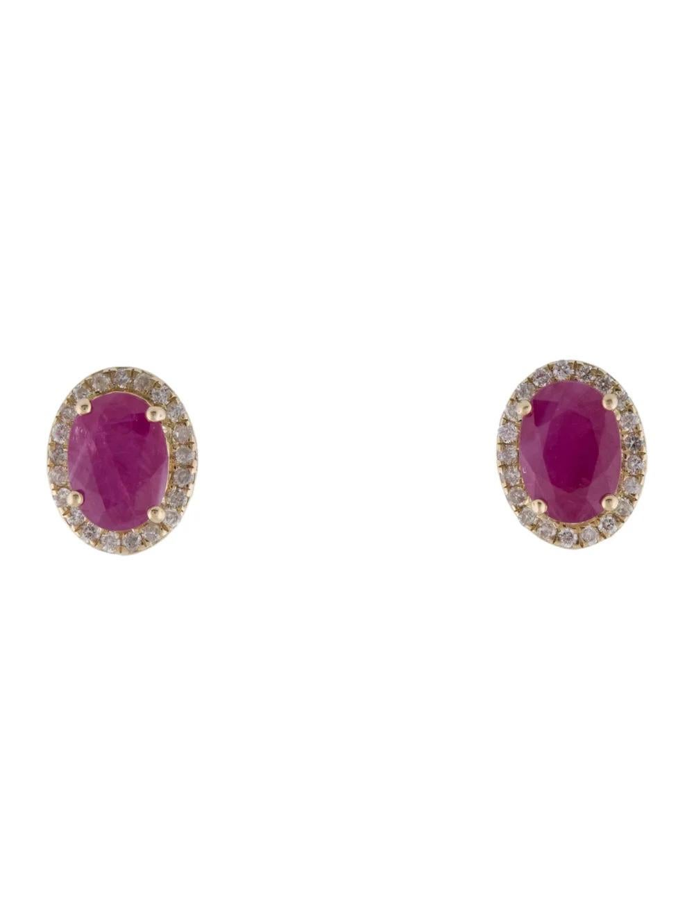 Experience timeless elegance with these exquisite 14K Yellow Gold Stud Earrings featuring captivating gemstones.

Specifications:

* Gemstone: Two faceted oval rubies totaling 2.31 carats
* Metal Type: Luxurious 14K yellow gold setting
* Total Item