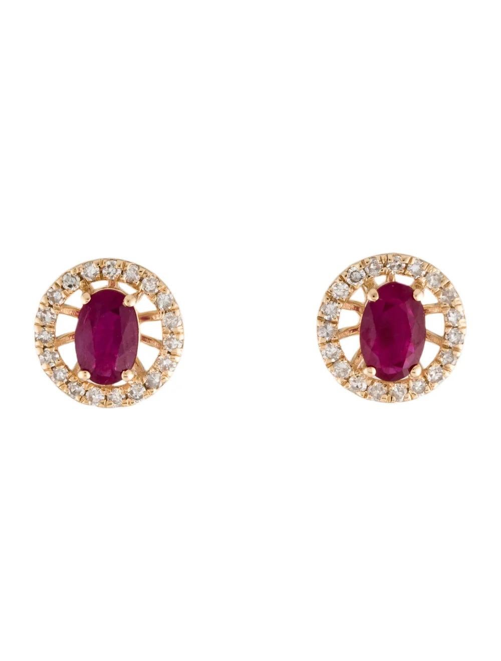 Introducing an exquisite pair of fine jewelry: the 14K Yellow Gold Ruby & Diamond Stud Earrings. These stunning earrings feature two faceted oval rubies, totaling 0.84 carats, surrounded by 38 sparkling single-cut diamonds, totaling 0.22