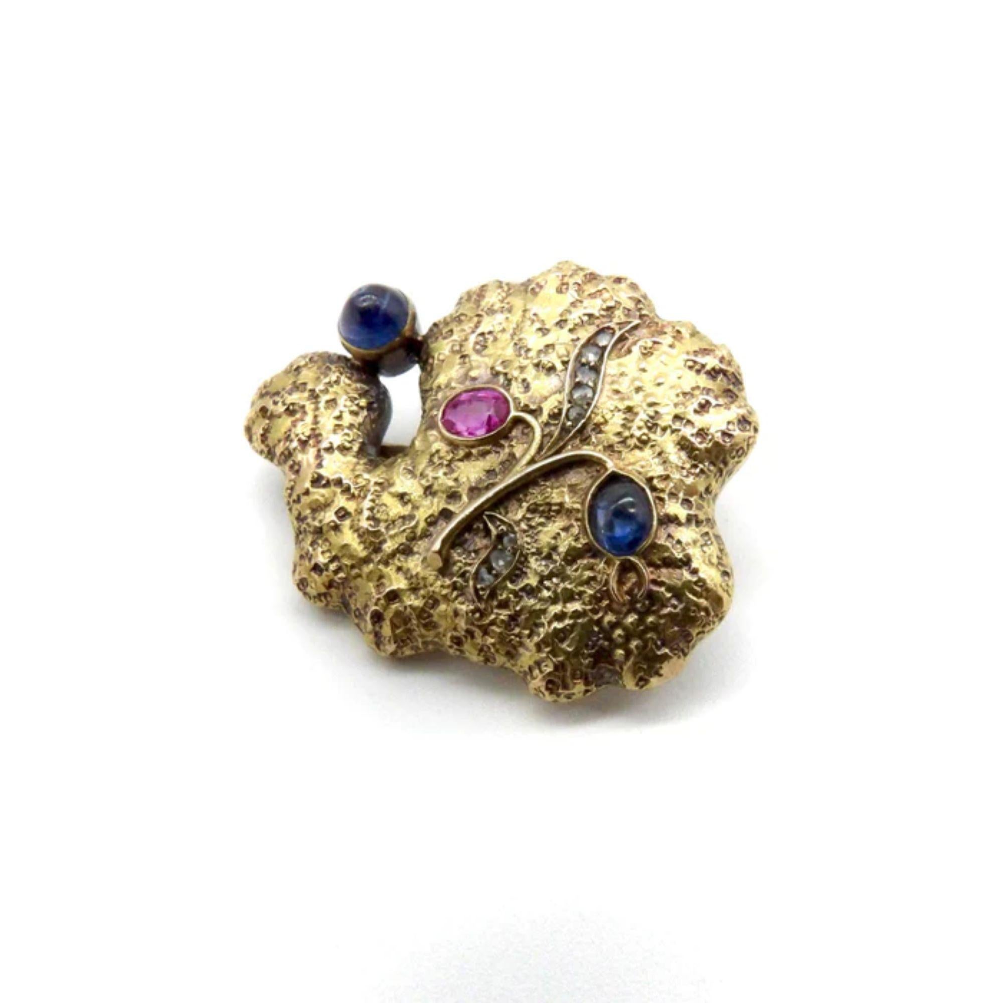 14K Russian Gold Sapphire, Diamond, and Ruby Organic Brooch

This 14k gold Russian brooch has an organic form and wonderful texture that is reminiscent of a coral head . A beautiful patina adds to its elegance and the soft, abstract shape is