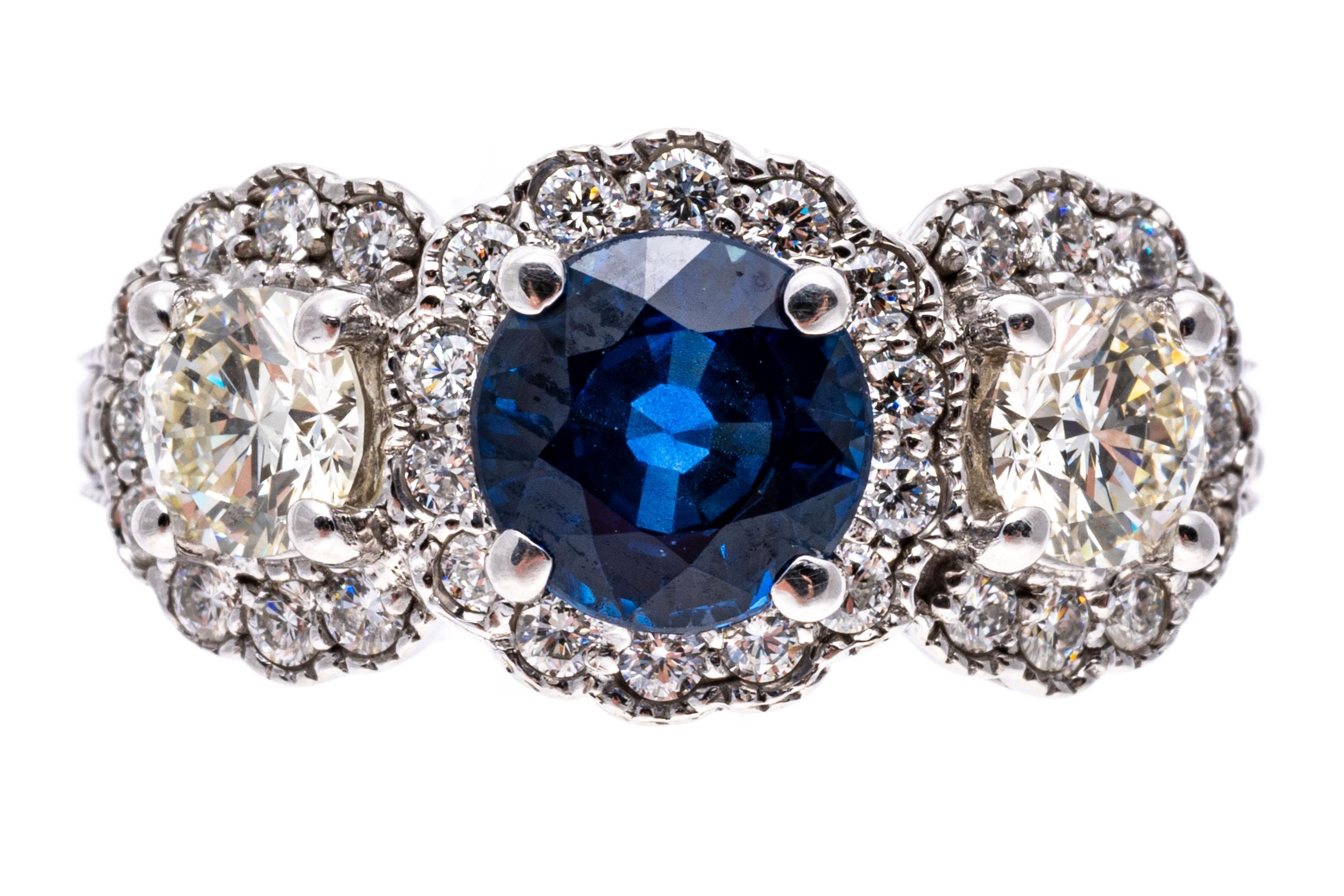 14k White Gold Blue Sapphire and Diamond Halo Three Stone Ring, App. 0.57 TCW For Sale 3