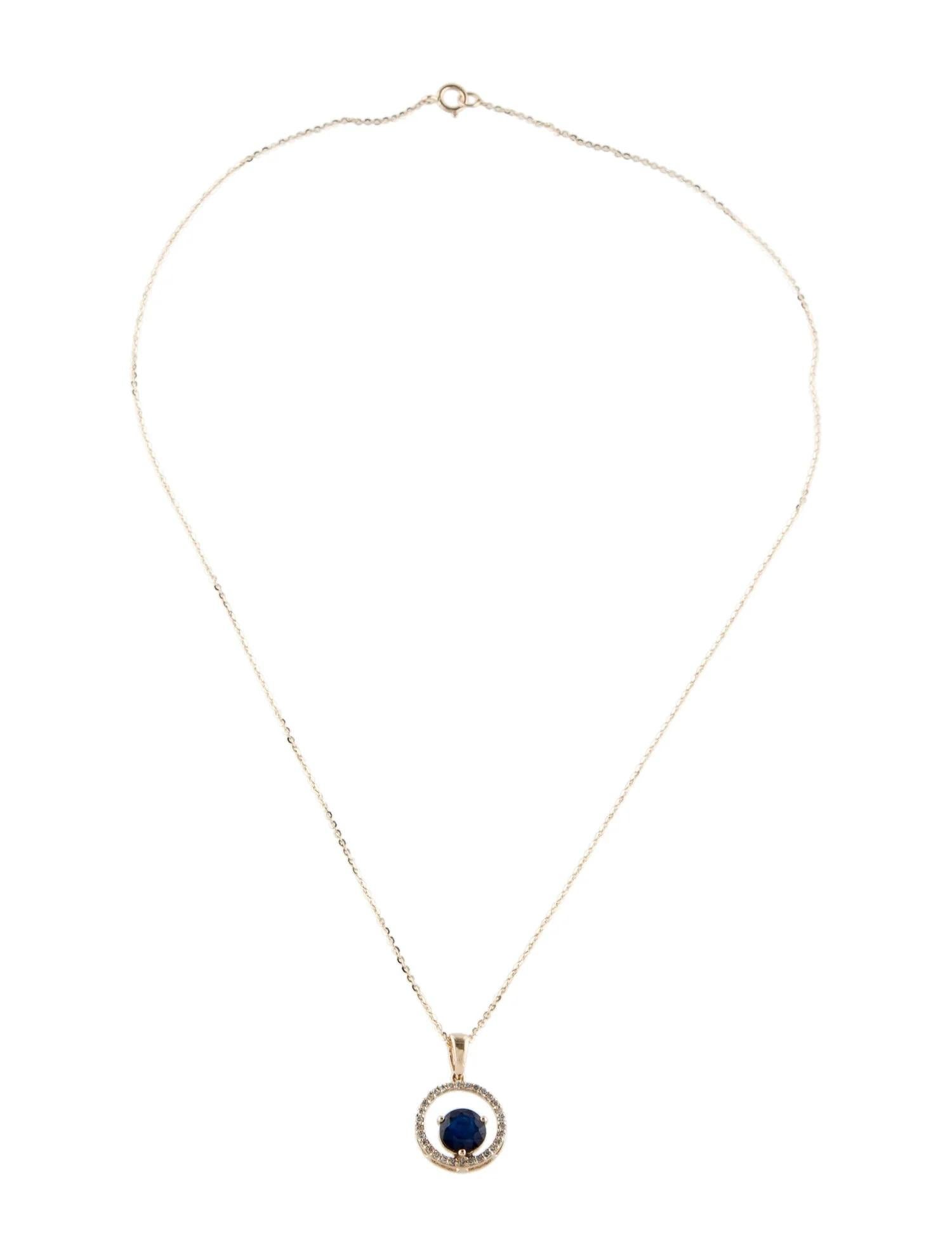 Artiste Collier pendentif 14K saphir et diamant - saphir rond à facettes de 0,72 carat en vente
