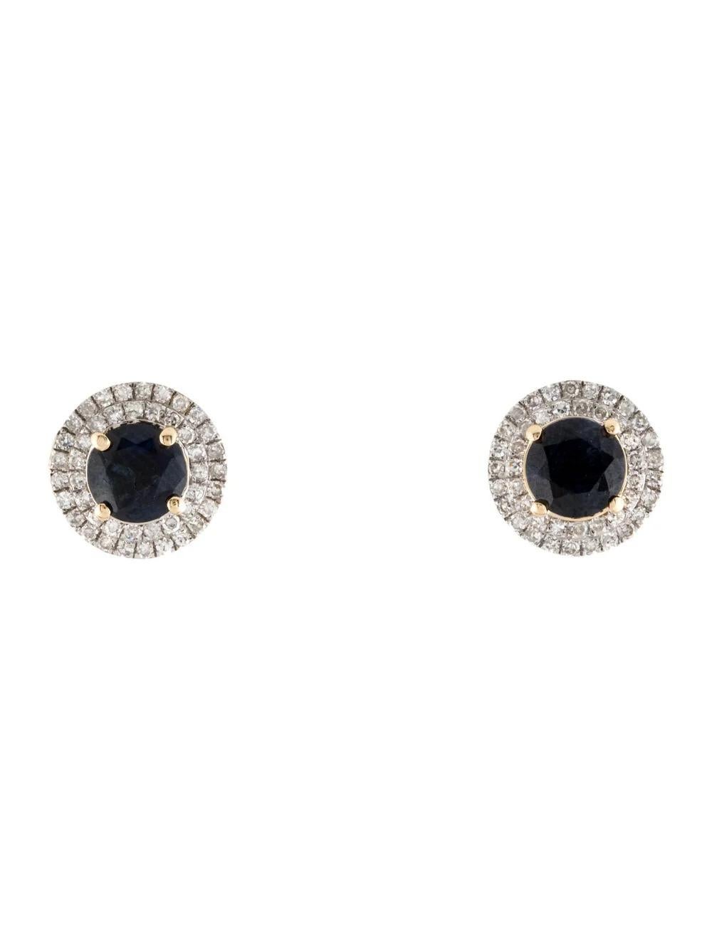 Elevate your elegance with these exquisite 14K Yellow Gold earrings, featuring two stunning Round Brilliant Sapphires totaling 1.92 carats. The deep blue hue of the sapphires is complemented by 88 dazzling Diamonds, totaling 0.44 carats, set in a