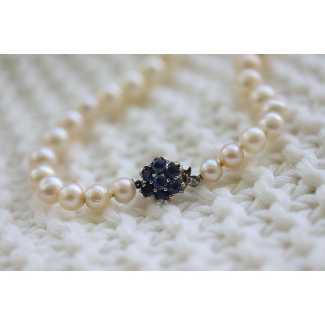 Vintage from the 1950s
Materials: Stone
Gemstone: Pearl
Closure: Slide lock
Chain style: Bead
Jewelry style: Art deco

Necklace length: 15 Inches

Beautiful Vintage Pearl Necklace. One Thread Chocker at 15in length. Closure is 14k White gold set