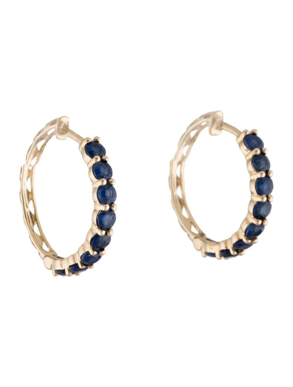 Introducing our exquisite 14K Yellow Gold Sapphire Hoop Earrings, a stunning addition to your fine jewelry collection.

Specifications:

* Metal: 14K Yellow Gold
* Length: 0.75