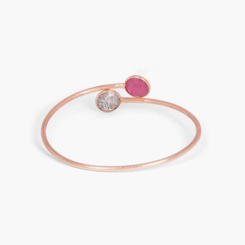 14K satin rose gold Kensington bangle with black rutilated quartz and ruby root

Elegant and classic, the Kensington collection has different colour combinations of faceted semi-precious stones set within a 14K rose gold satin finish bezel setting.
