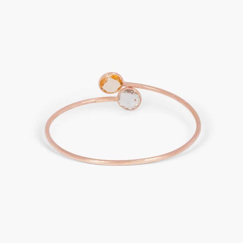 14K satin rose gold Kensington bangle with garnet and prasiolite

Elegant and classic, the Kensington collection has different colour combinations of faceted semi-precious stones set within a 14K rose gold satin finish bezel setting. There are