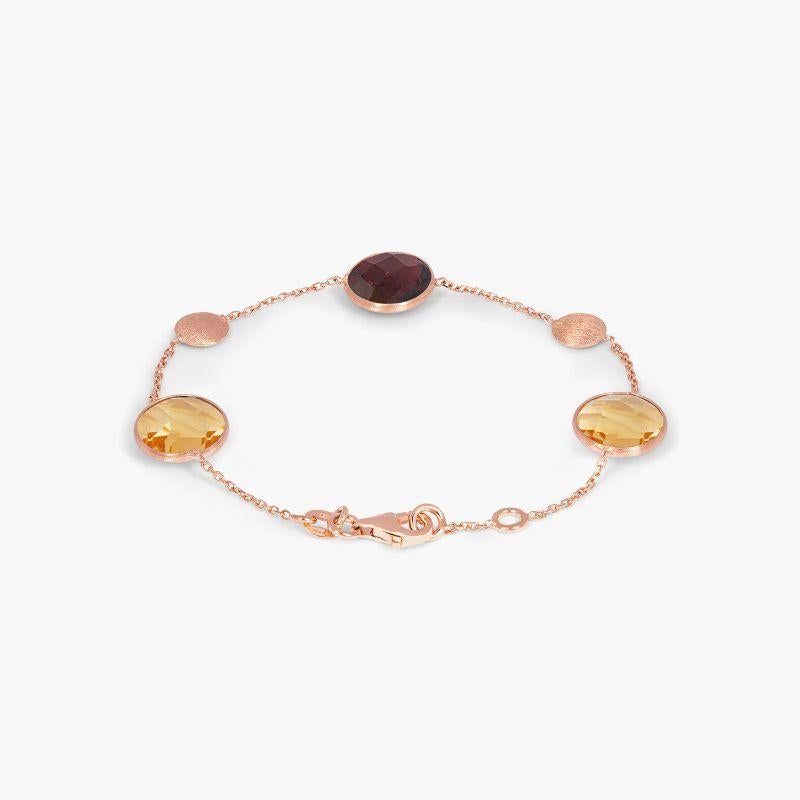 14k satin rose gold Kensington double stone bracelet in garnet and citrine

This bracelet features two faceted stones set on a delicate chain. Each stone is bezel set and holds a unique meaning, with garnet being the stone of protection and citrine