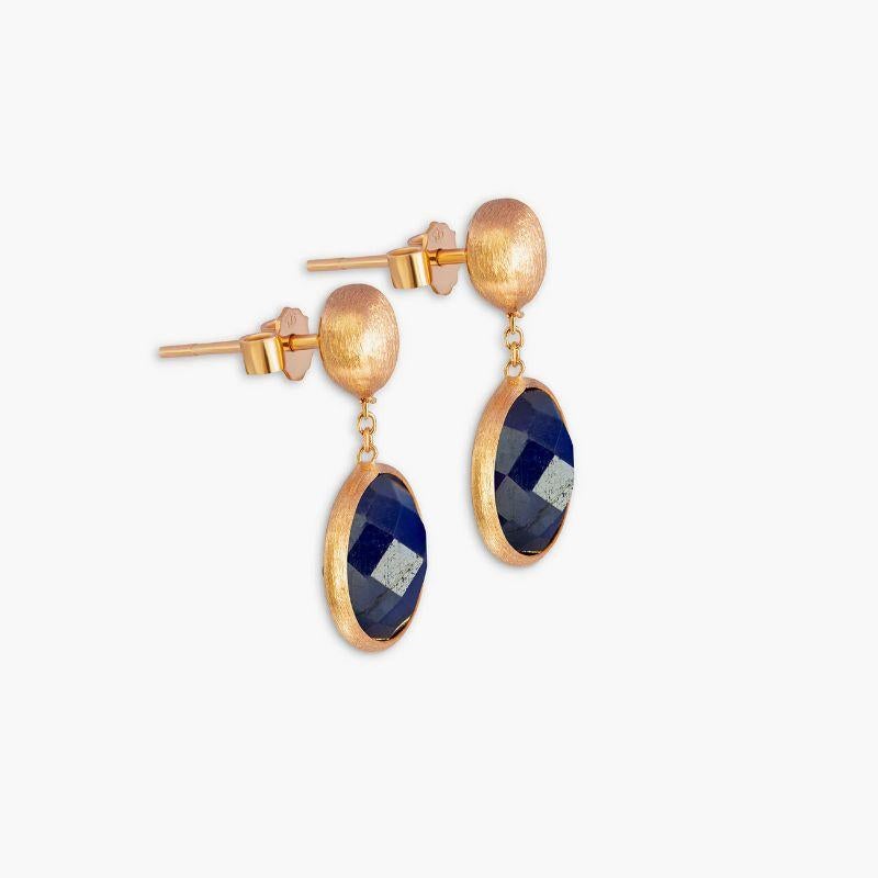 14K satin rose gold Kensington drop earrings with sapphire

These drop earrings feature faceted stones that dangle from a short-chain. Each stone is bezel set and holds a unique meaning, with sapphire being the stone of joy and wisdom. These