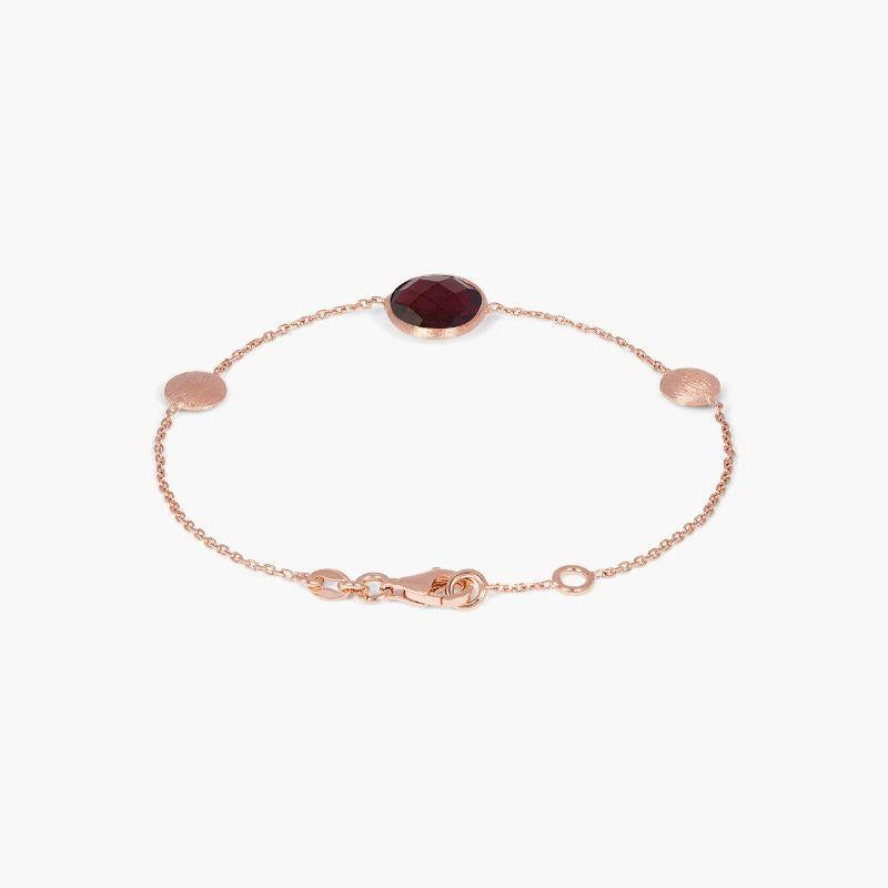 14k satin rose gold Kensington single stone bracelet in garnet

This bracelet features a faceted stone set on a delicate chain. Each stone is bezel set and holds a unique meaning, with garnet being the stone of protection. This bracelet is made from