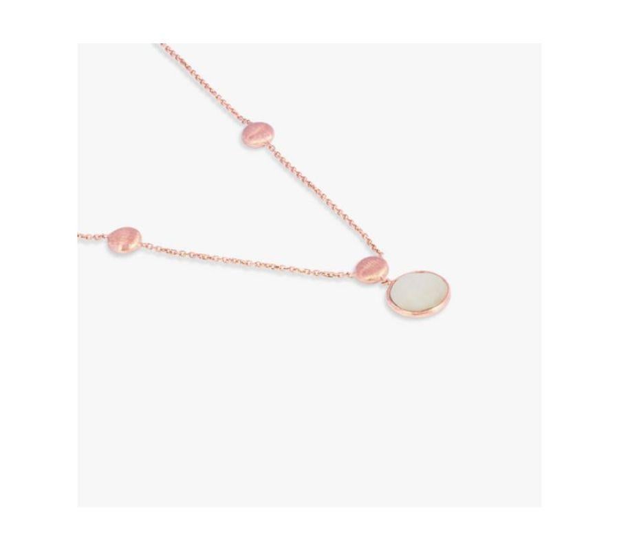 14K satin rose gold Kensington single stone necklace with white mother of pearl

This necklace features a faceted stone set on a delicate chain. Each stone is bezel set and holds a unique meaning, with mother of pearl being the stone of prosperity.