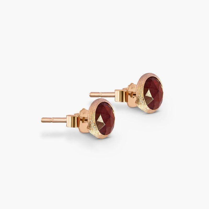 14K satin rose gold Kensington stud earrings with garnet

These stud earrings feature faceted stones that are bezel set. Each stone holds a unique meaning, with garnet being the stone of protection. These earrings are made from 14K rose gold and