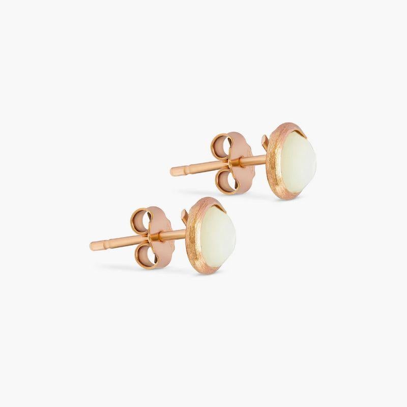 14K satin rose gold Kensington stud earrings with white mother of pearl

These stud earrings feature faceted stones that are bezel set. Each stone holds a unique meaning, with mother of pearl being the stone of prosperity. These earrings are made