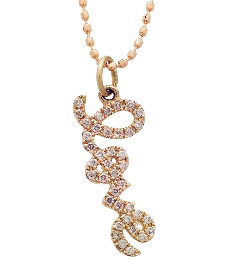 Capture the essence of star-quality elegance with this Small Gold and Diamond Love Pendant Necklace from Sydney Evan. 
Adorned with 0.14 carats of sparkling diamonds, this piece shines in a 14k yellow gold setting that gracefully forms the word