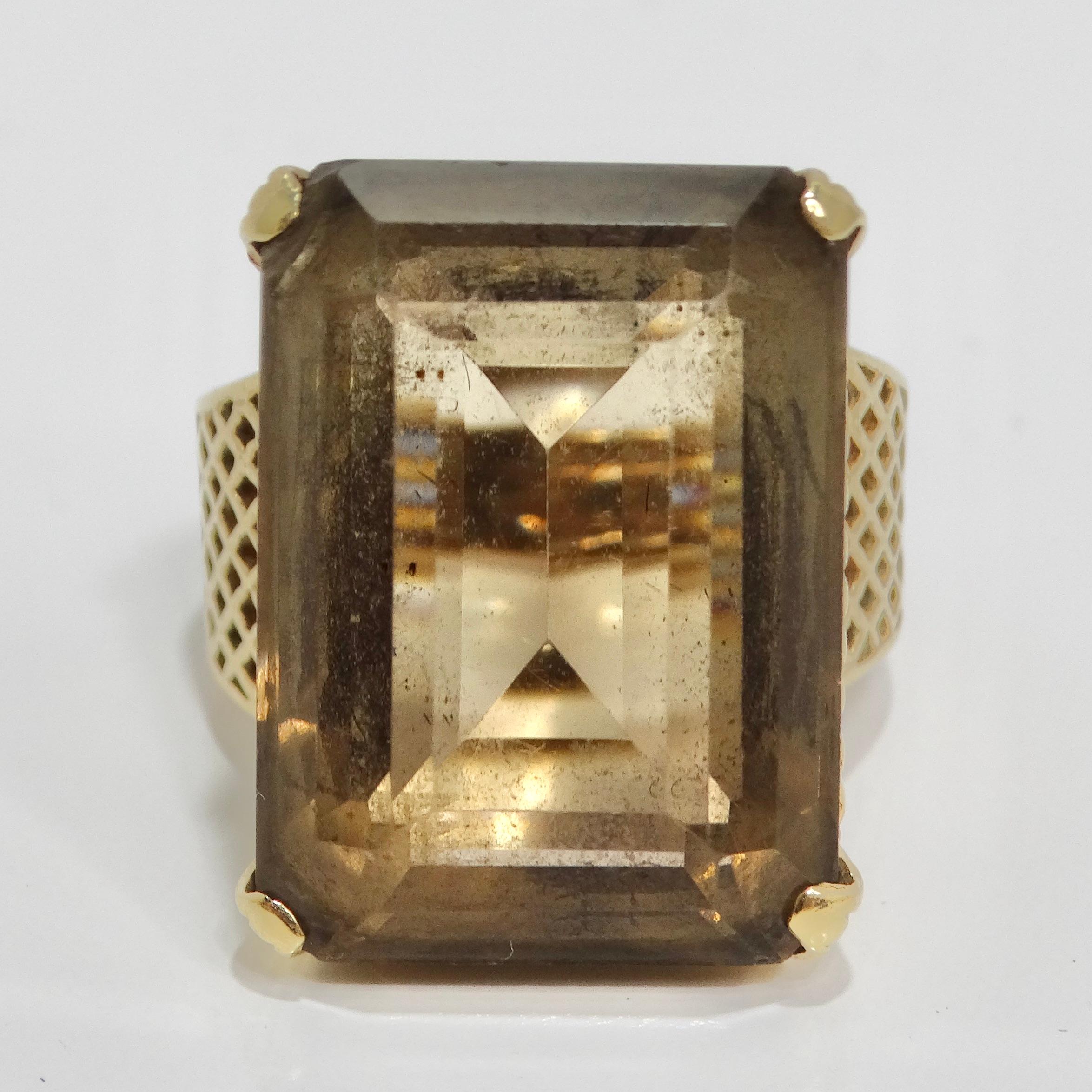 Make a bold and timeless statement with the 14K Solid Gold 1970s Quartz Ring – a stunning piece that combines elegance with a touch of vintage flair. This ring features a solid yellow gold band with a basket weave engraved motif, showcasing the