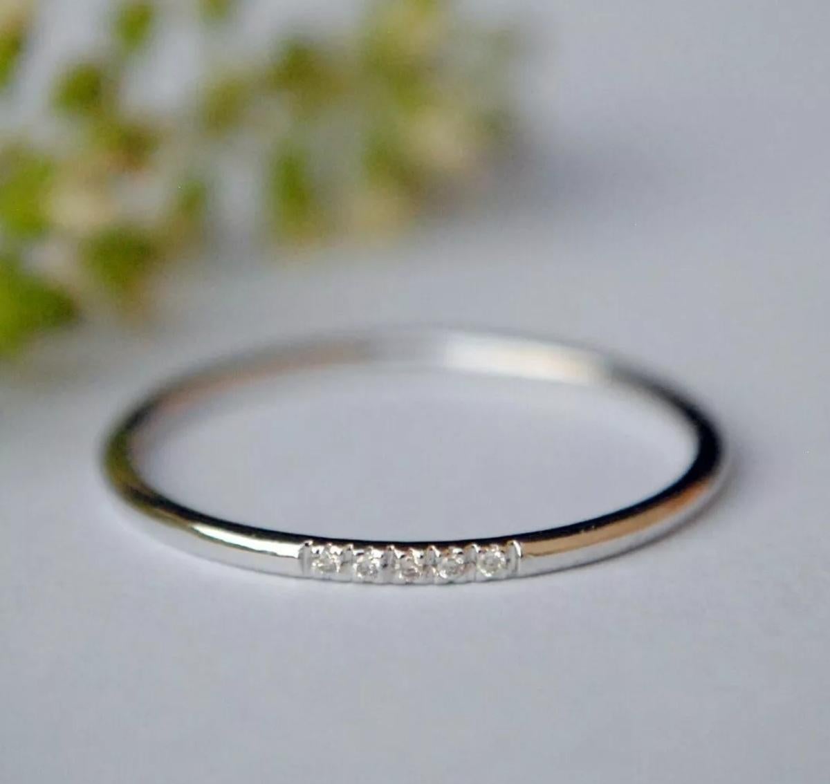 14k Solid Gold 1mm Dainty Band Diamond Thin Skinny Wedding Band Stack Ring Gift.

Total Carat Weight
0.24 & Under
Base Metal
Yellow Gold, 14k
Diamond Weight
0.02-0.03 cts Approx
Metal Purity
14k
14k Gold Weight
0.80-1.2 Grams Approx
Main Stone