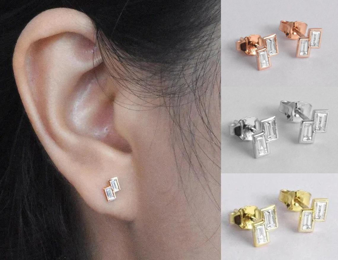 Baguette Diamond Stud Earrings in 14k Rose Gold, Yellow Gold, White Gold.

These Dainty Stud Earrings are made of 14k solid gold featuring shiny brilliant round cut natural diamonds set by master setter in our studio. Simple but unique, elegant and