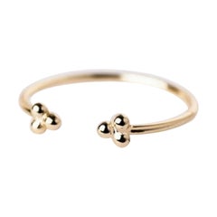 Anello minimalista a tre sfere aperte in oro massiccio 14k.