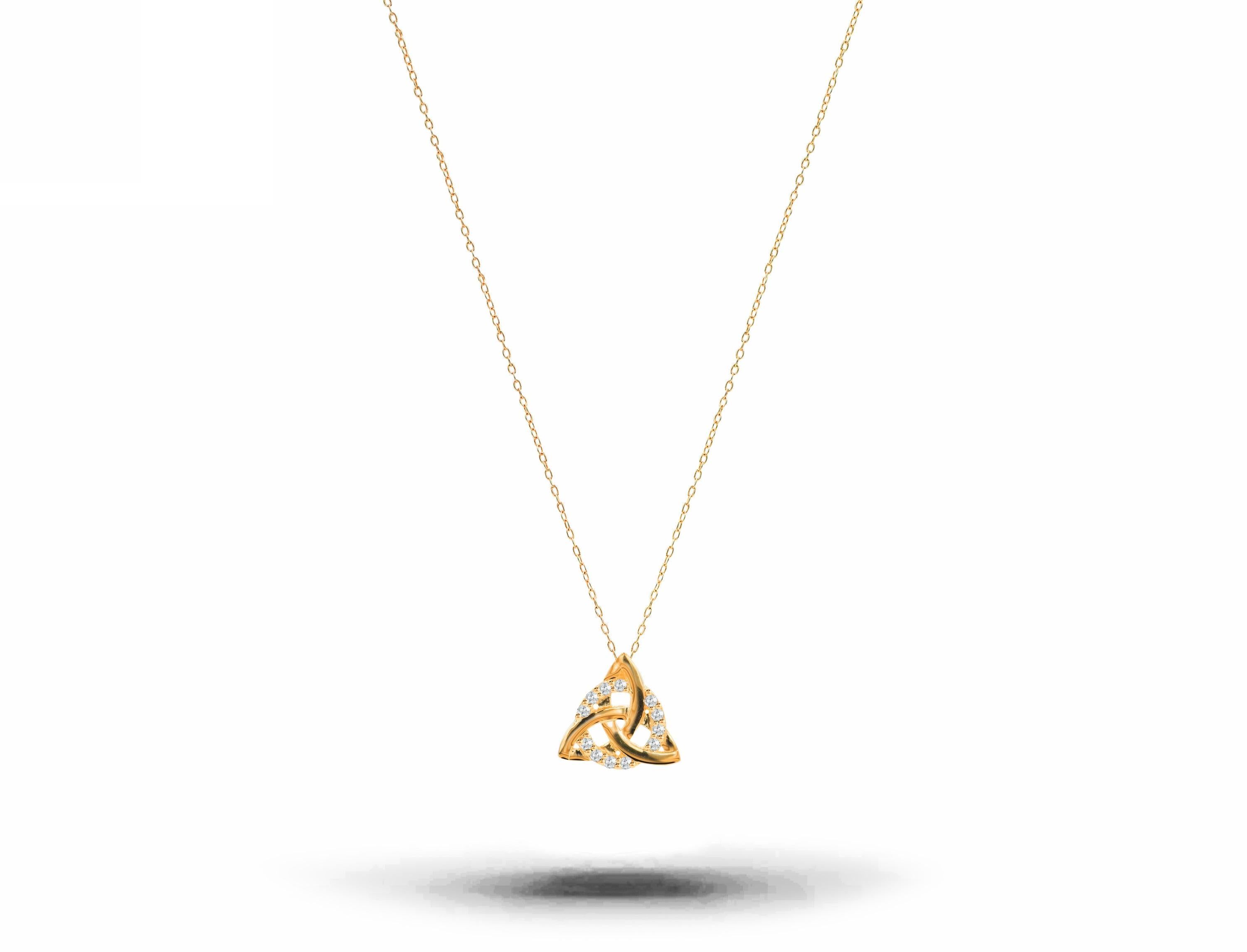 A beautiful little Celtic Knot Pendant is made of 14k solid gold adorned with natural white round cut diamonds.
Available in three colors of gold: White Gold / Rose Gold / Yellow Gold.

Perfect for wearing by itself for a minimal everyday style or