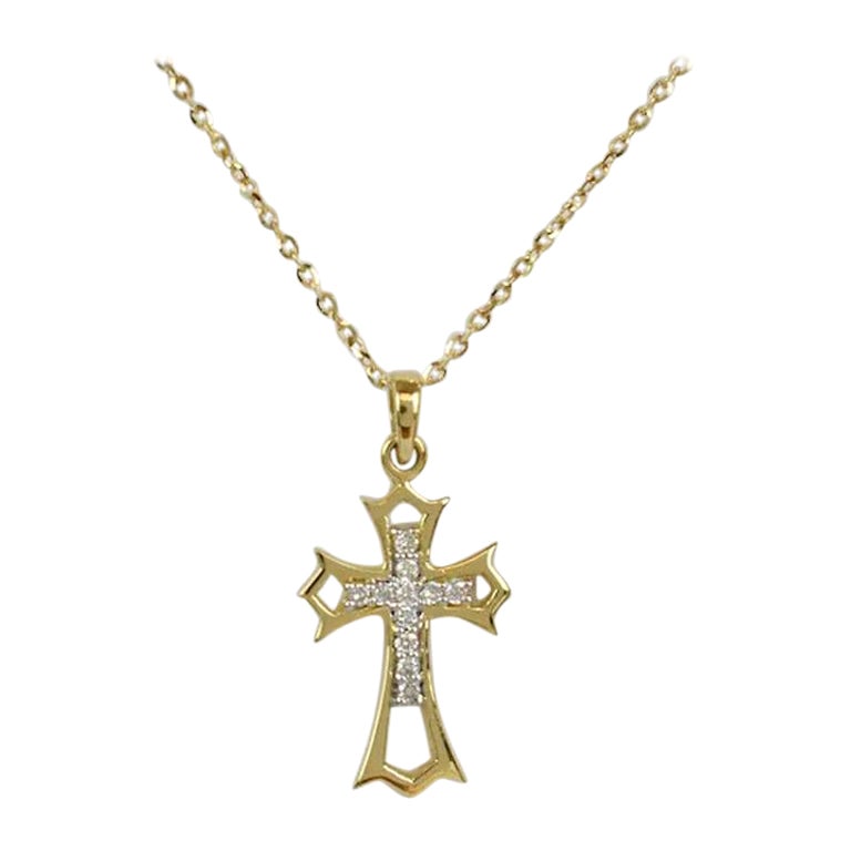 Diamond Cross Necklace is made of 14k solid gold.
Available in three colors of gold: Yellow Gold / Rose Gold / White Gold.

11 round cut diamonds set the shape of the simple and elegant design pendant. The diamonds are very high quality and have a