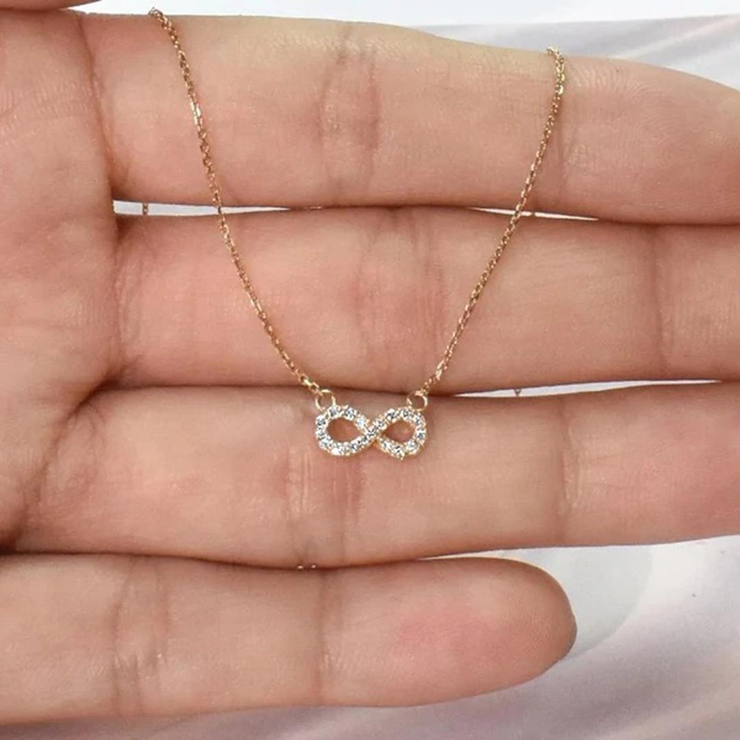 Diamond Infinity Necklace made of 14k solid gold available in three colors of gold, White Gold / Rose Gold / Yellow Gold.

Natural genuine round cut diamond each diamond is hand selected by me to ensure quality and set by a master setter in our
