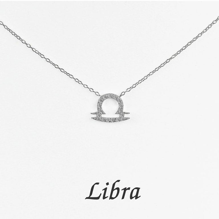 Beautiful and Sparkly Diamond Libra Necklace made of 14k solid gold available in three colors, White Gold / Rose Gold / Yellow Gold.

Natural genuine round cut diamond each diamond is hand selected by me to ensure quality and set by a master setter
