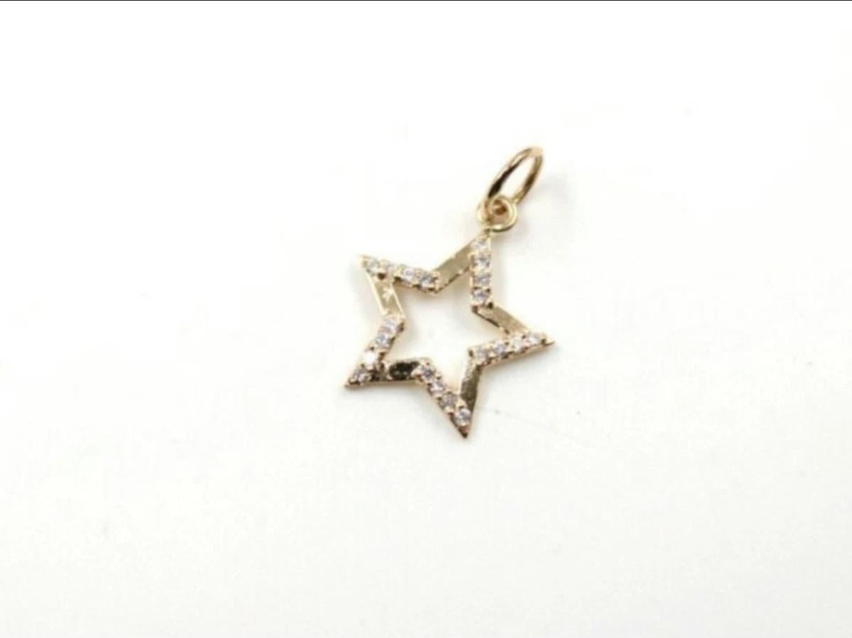 Collar de oro macizo de 14 quilates con estrella de diamantes Dainty Star Necklace Christmas Gift For Her.

Forma del colgante
Estrella
Número de diamantes
20
Talla
17x14mm Aprox
Color de la piedra principal
Blanco
Metal
Oro amarillo
Peso del