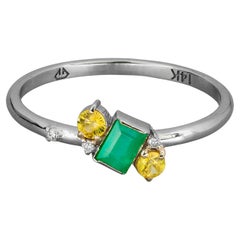 14k solid gold emerald ring.