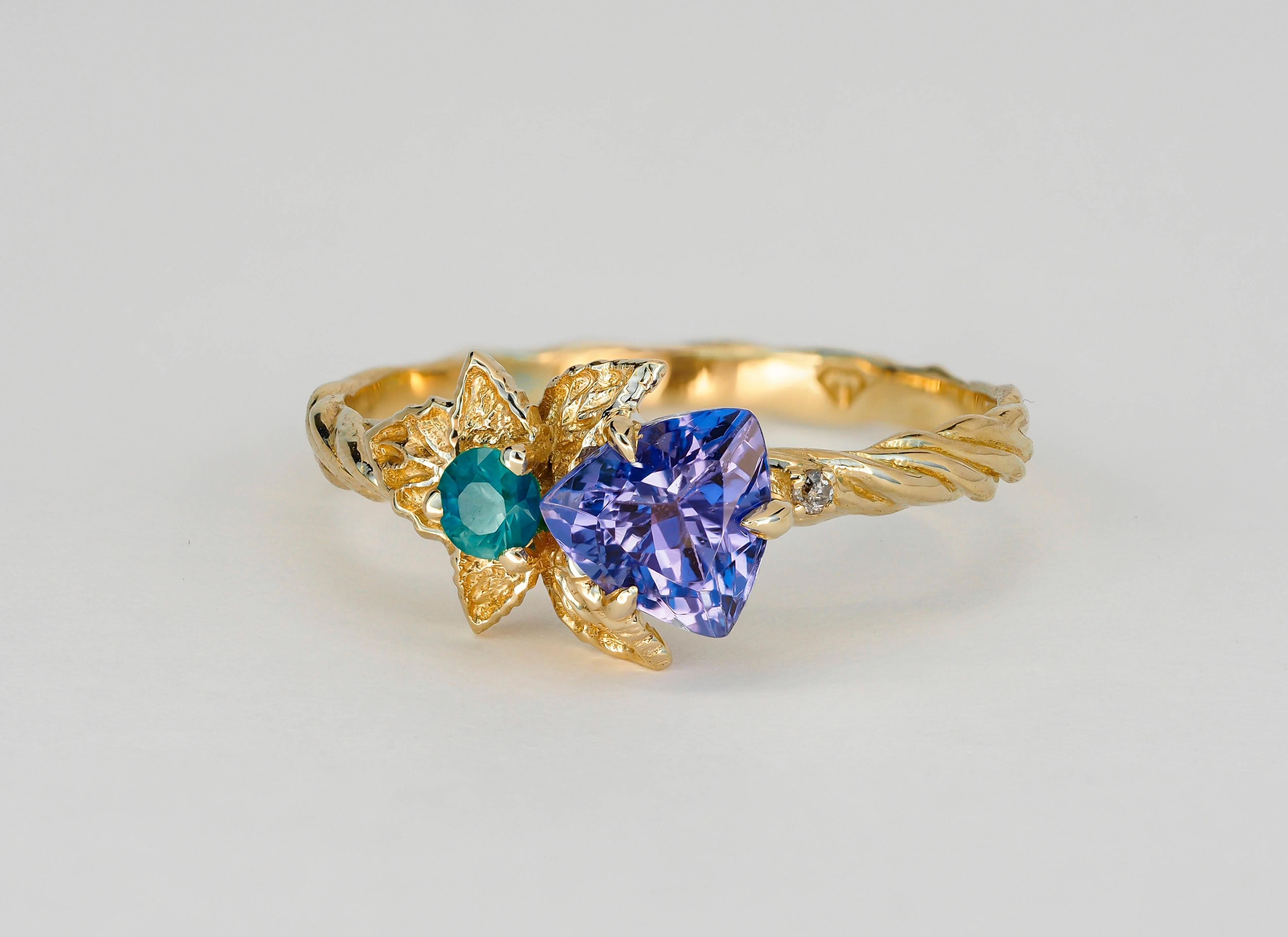 For Sale:  Tanzanite and diamonds 14k gold ring. Flower design ring with tanzanite. 13
