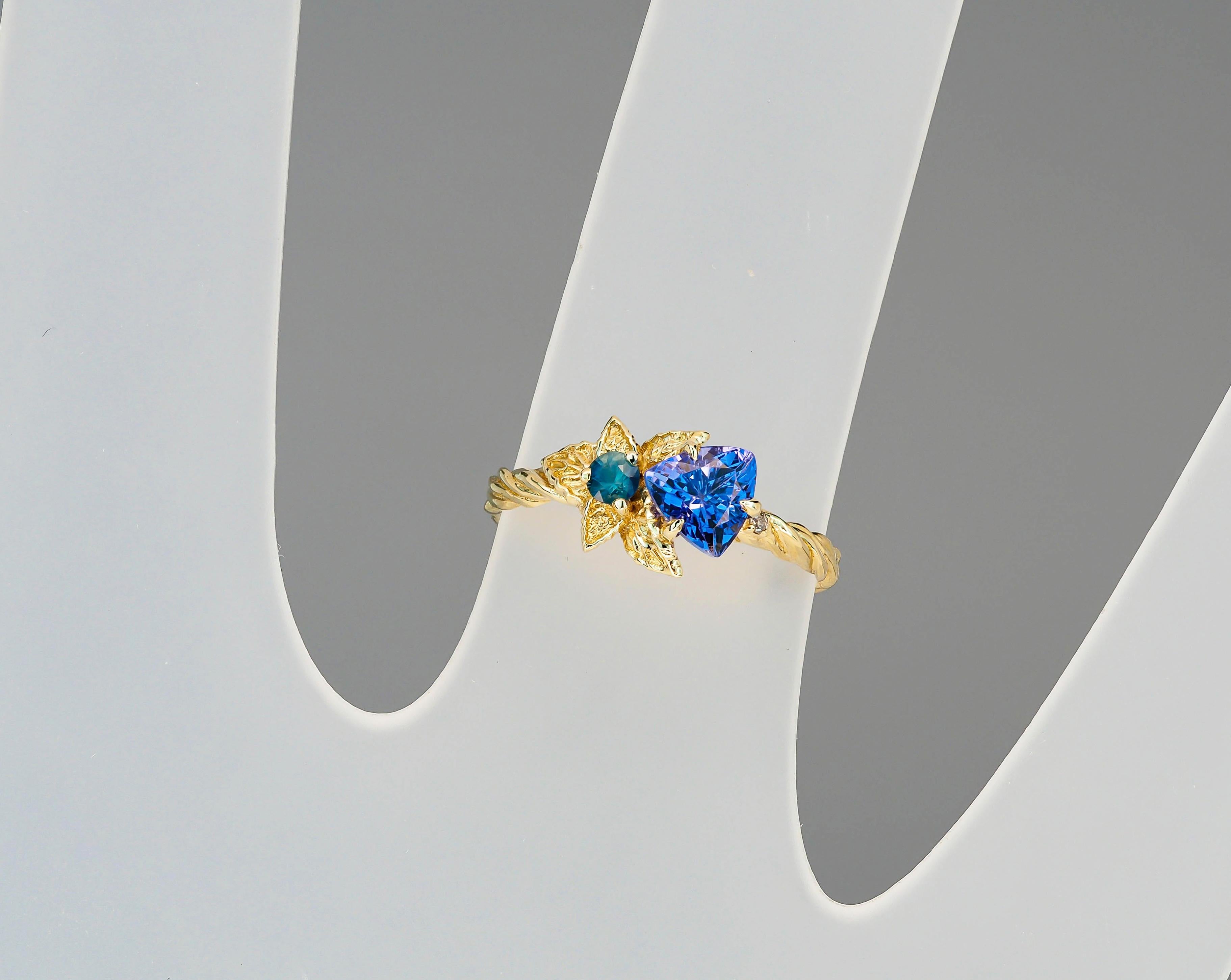For Sale:  Tanzanite and diamonds 14k gold ring. Flower design ring with tanzanite. 14