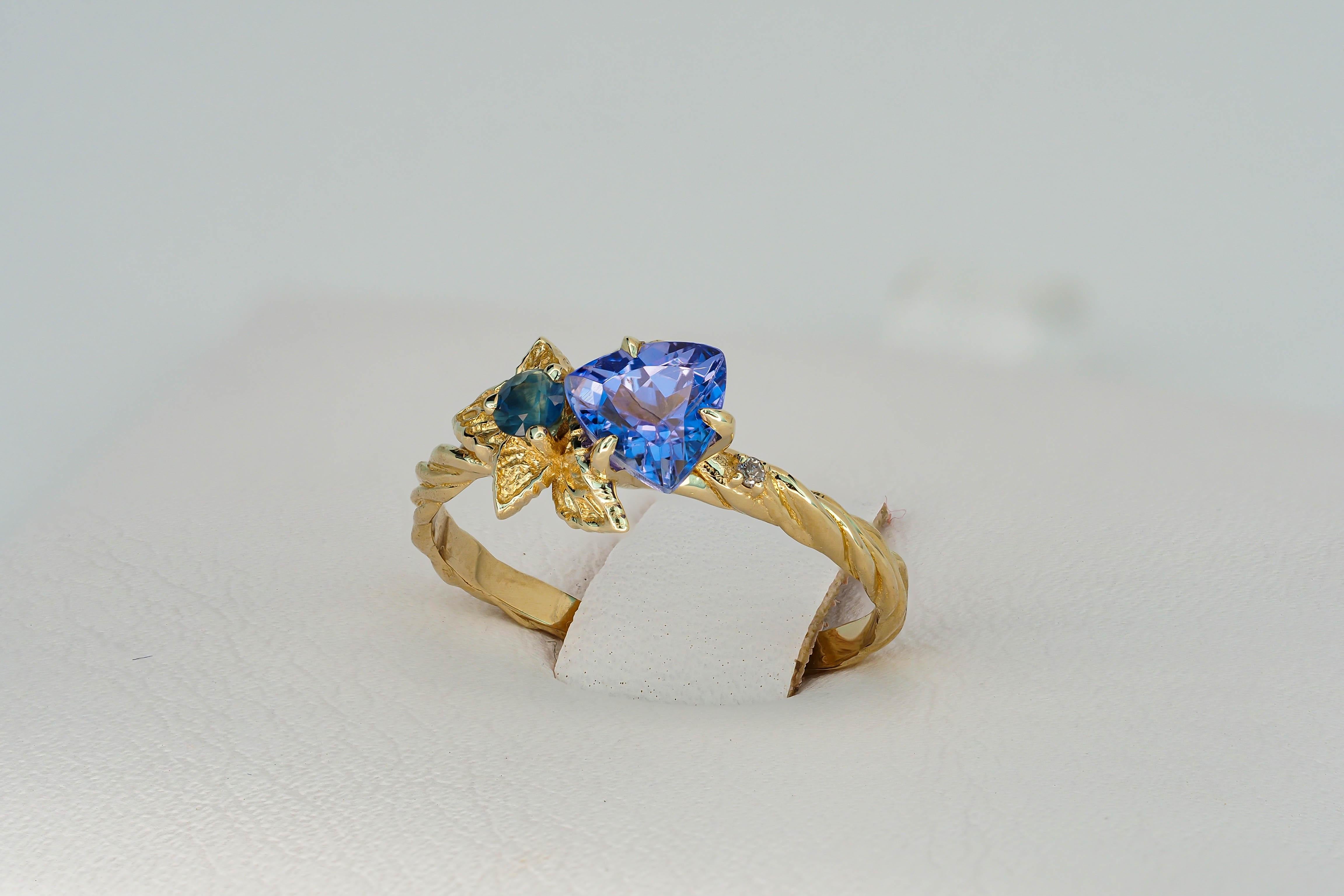 For Sale:  Tanzanite and diamonds 14k gold ring. Flower design ring with tanzanite. 7