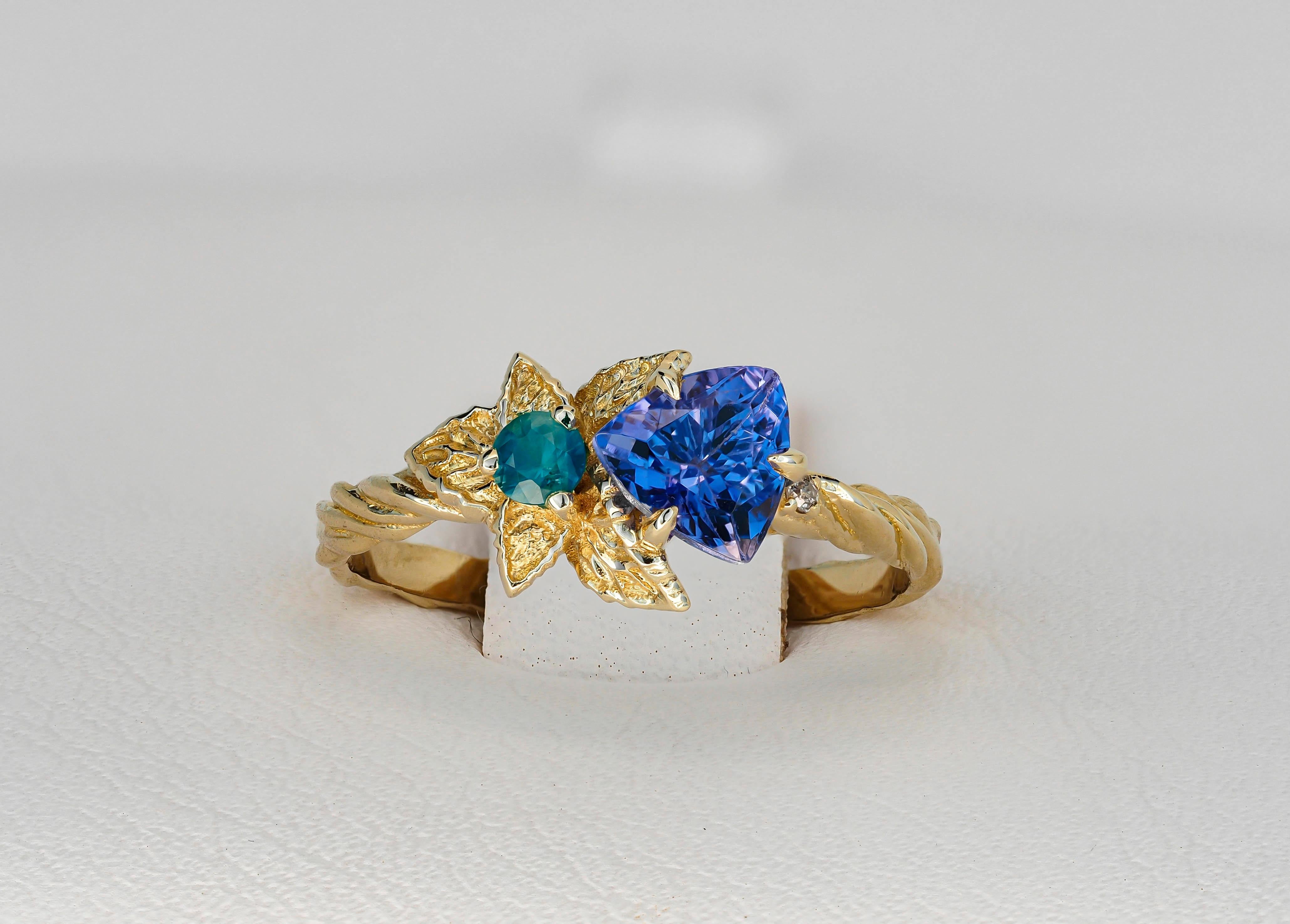 For Sale:  Tanzanite and diamonds 14k gold ring. Flower design ring with tanzanite. 8