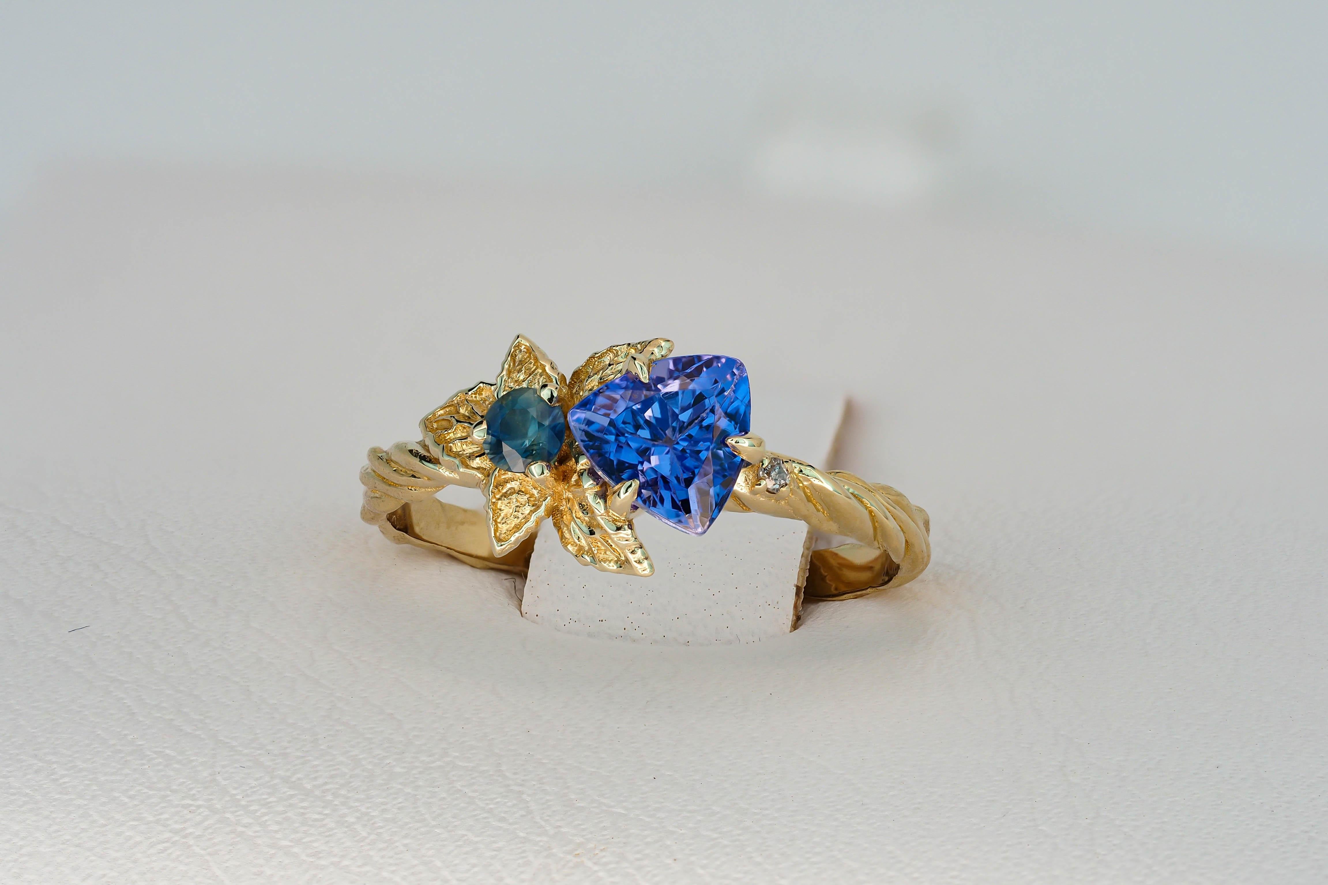 For Sale:  Tanzanite and diamonds 14k gold ring. Flower design ring with tanzanite. 9
