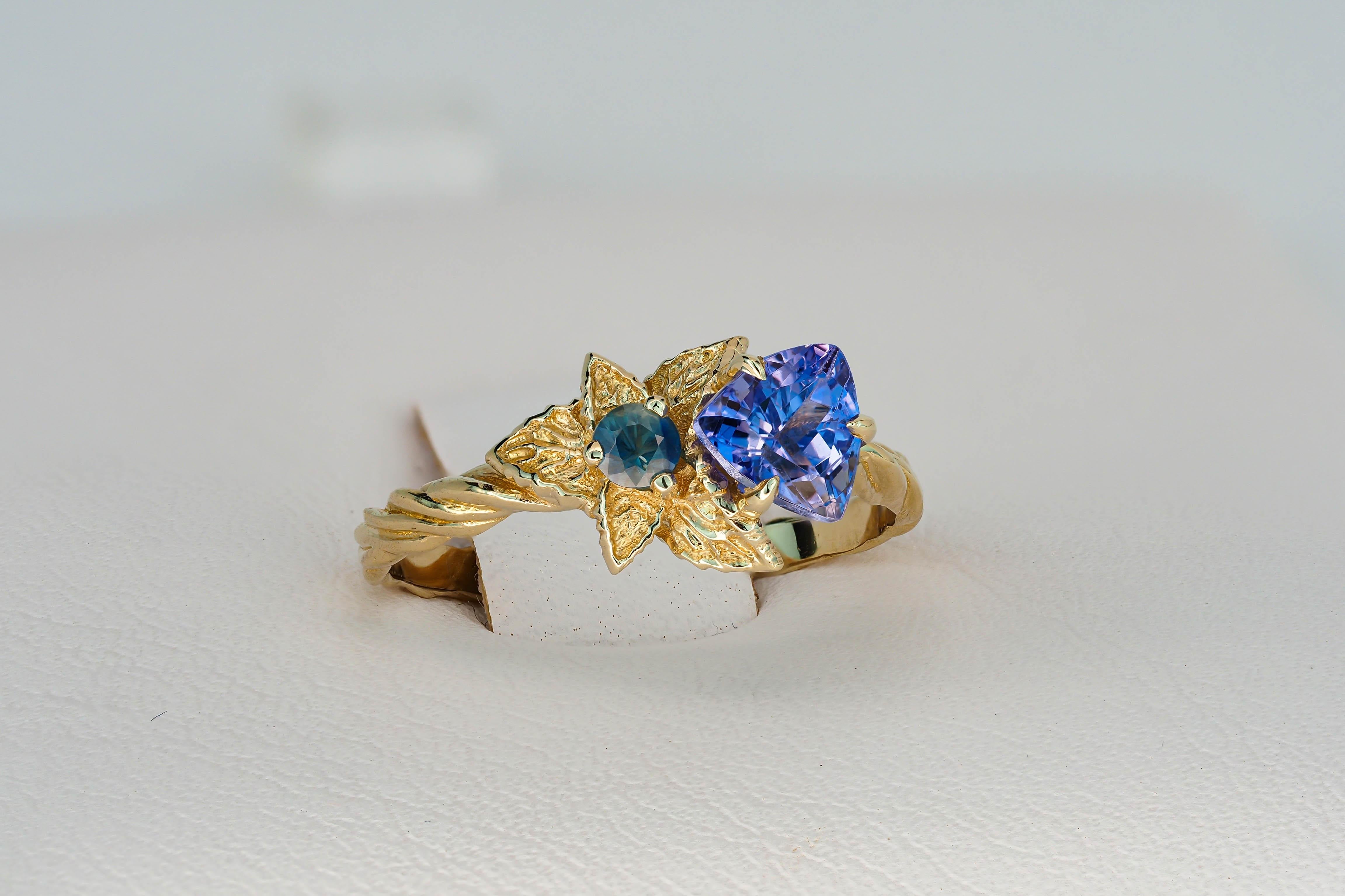 For Sale:  Tanzanite and diamonds 14k gold ring. Flower design ring with tanzanite. 10