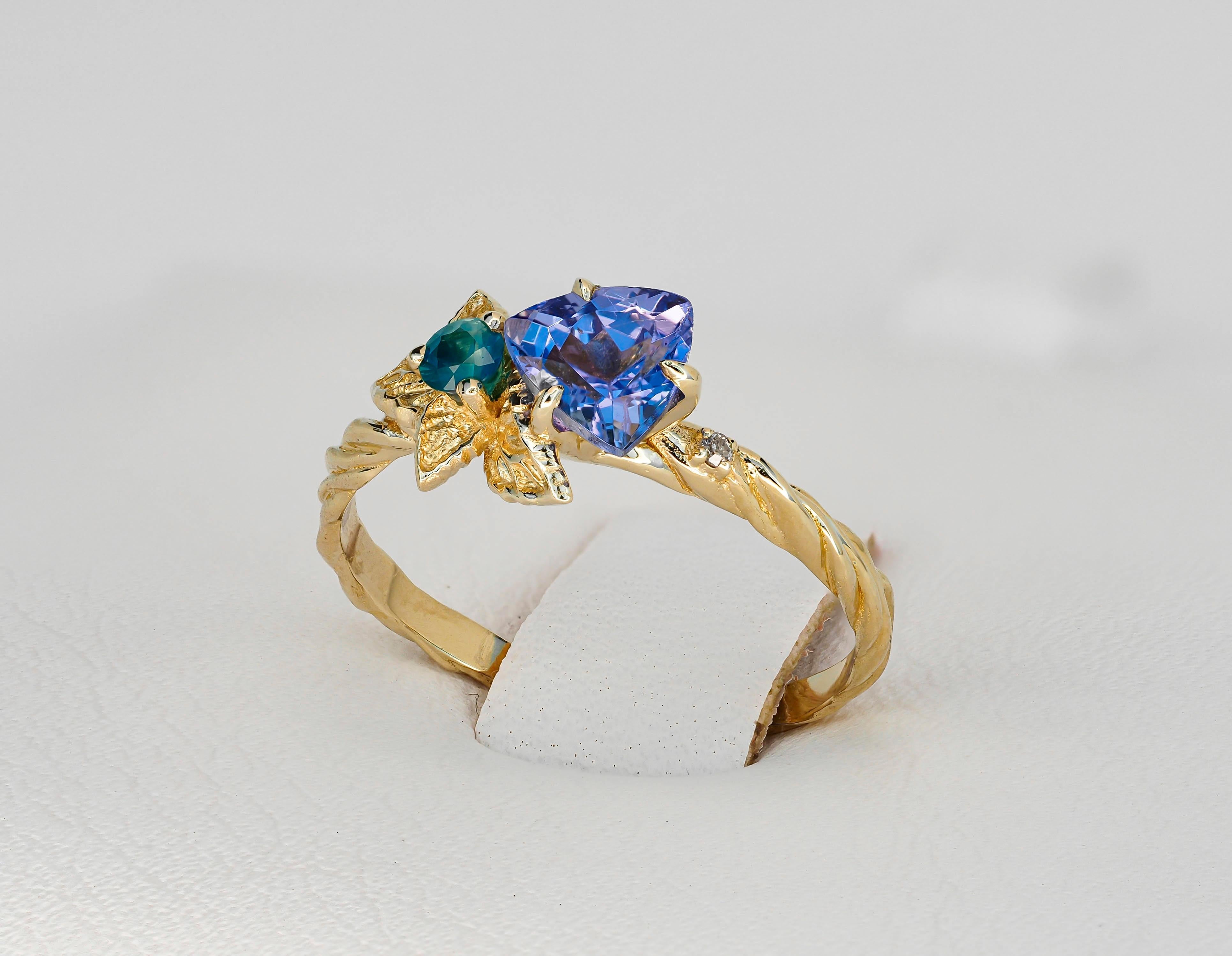 For Sale:  Tanzanite and diamonds 14k gold ring. Flower design ring with tanzanite. 11