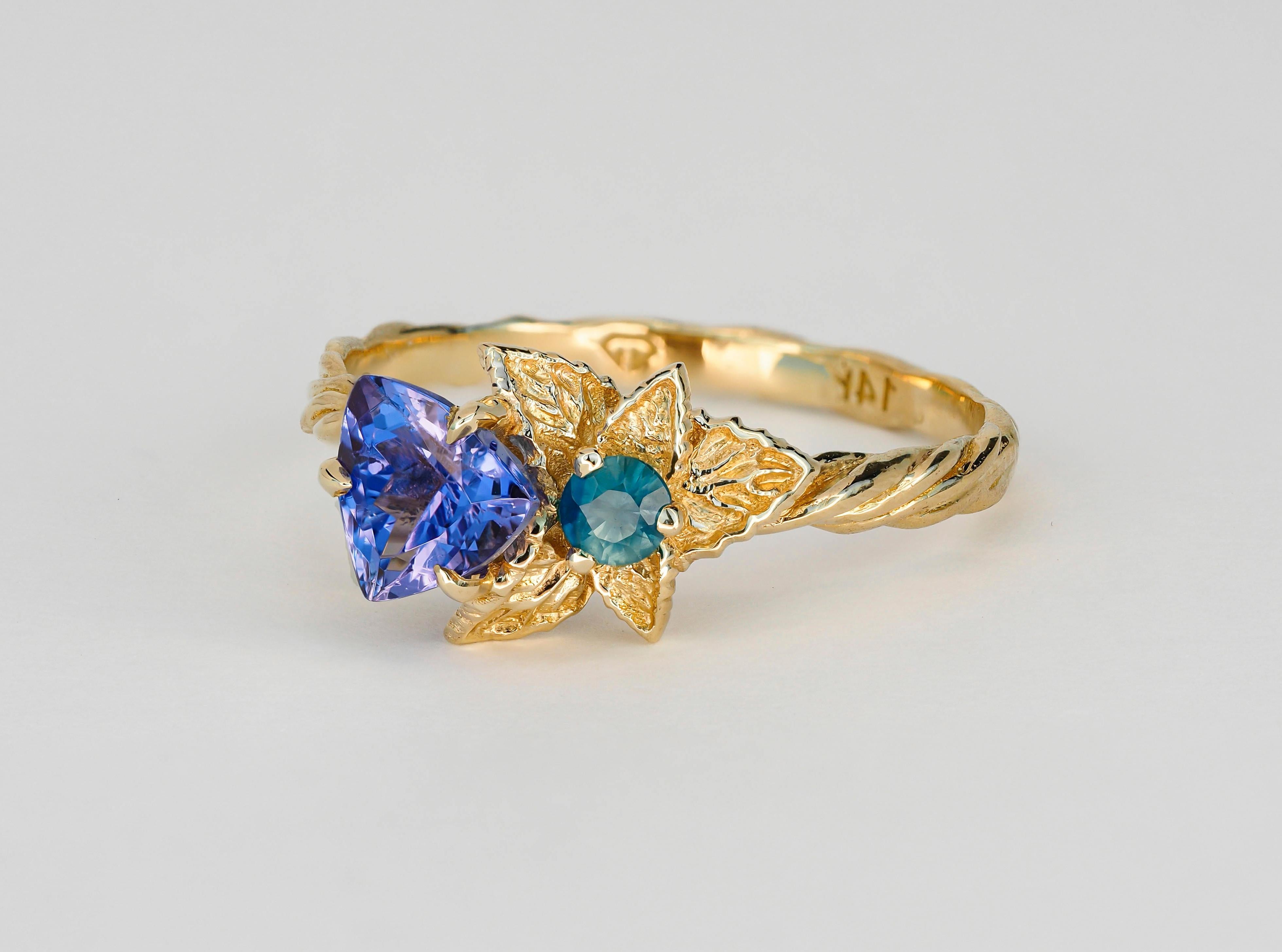 For Sale:  Tanzanite and diamonds 14k gold ring. Flower design ring with tanzanite. 12