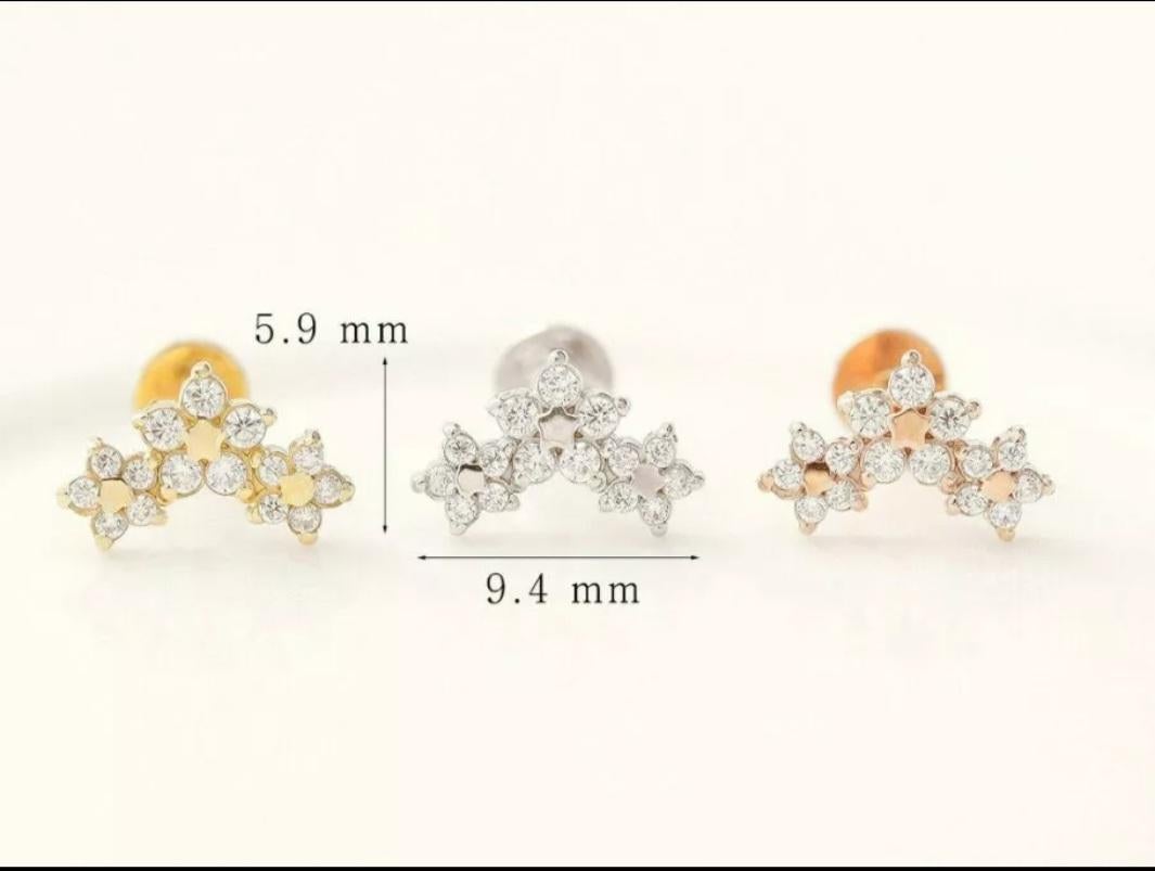 14k Solid Gold Genuine Diamond Star Earrings Triple Stars Threaded Piercing 

Total Carat Weight
0.24 & Under
Gauge
16G(1.2mm)
Post Length
6.5mm Approx
Diamond Weight
0.20 Ctw Approx
Size
5.9x9.4 mm Approx
Base Metal
Yellow Gold
Certification
BIS