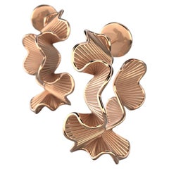 Boucles d'oreilles créoles en or massif 14 carats conçues et fabriquées en Italie