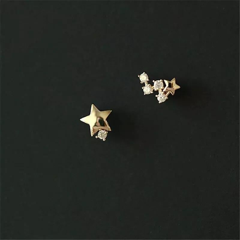14K Solid Gold Japanese Asymmetric Star Stud Earrings Women Modern Diamond Studs
Light weight can be worn everyday

Additional information:
Material: 14k White Gold, Natural Diamond
Base Metal: White Gold
Main Stone: Diamond
Secondary Stone: