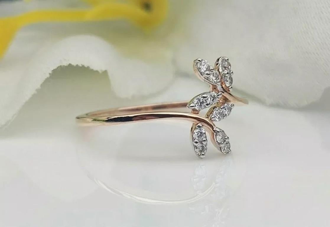 14k Solid Gold Leaf Diamond Ring Handmade Diamond Fashion Wedding Ring Gift
Light weight can be worn everyday

Additional information:
Base Metal: Rose Gold, 14k
Main Stone Shape: Round
Main Stone: Diamond
Secondary Stone: Diamond
Ring Shape: