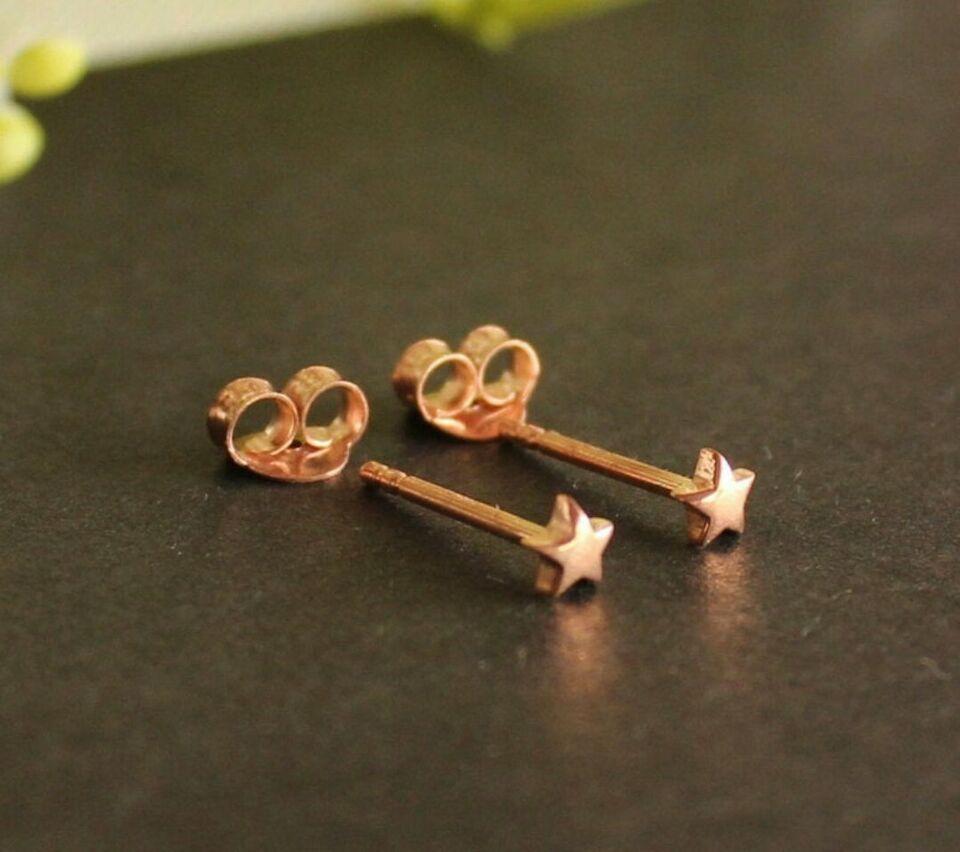 14k Solid Gold Mini Star Piercing Gold Body Piercing Dainty Celestial Jewelry

Base Metal: 14K Rose Gold.
Item Length: 6 mm.
Gauge (Thickness): 18g (1 mm).
Certification: 14K Hallmarked.
Size: 4x4 mm Approx.